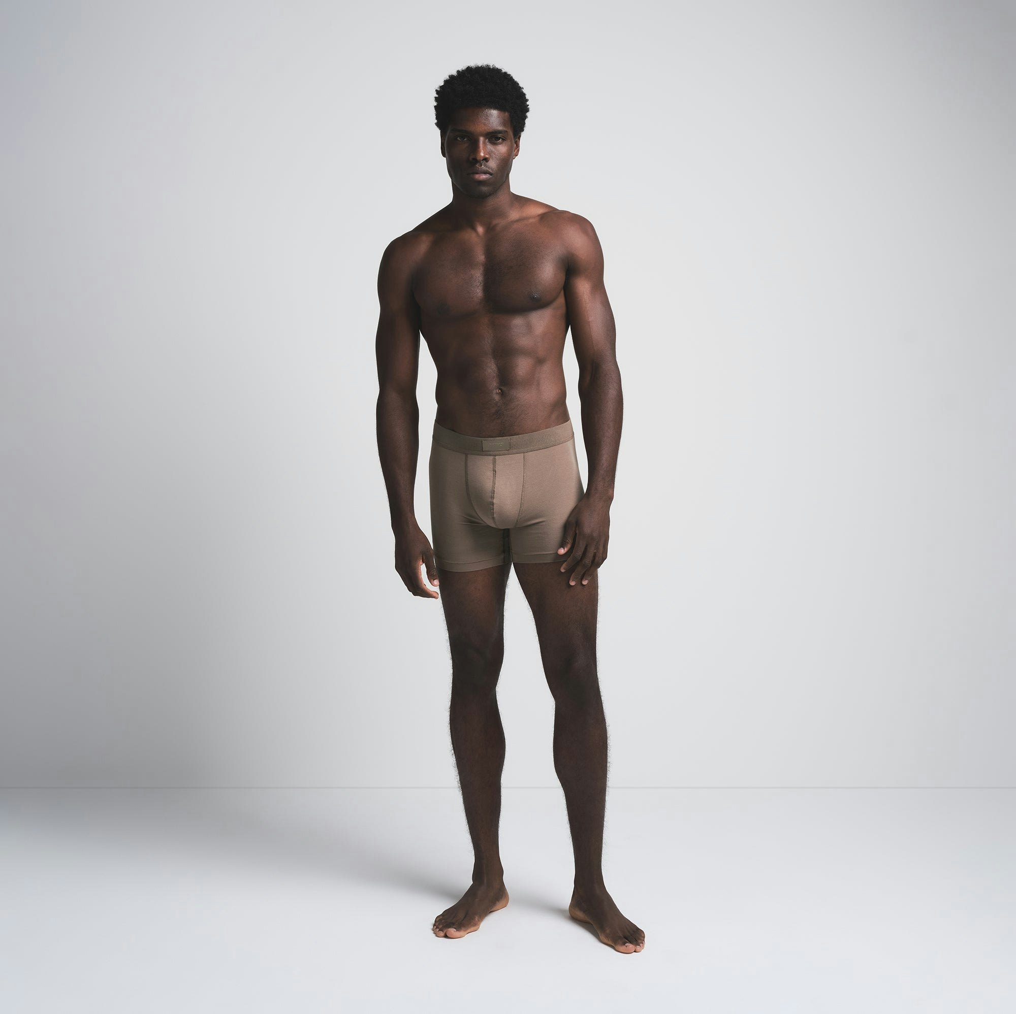 SKIMS COTTON MENS 3" BOXER BRIEF 3-PACK | MERLOT MULTI ON A MODEL FRONT VIEW