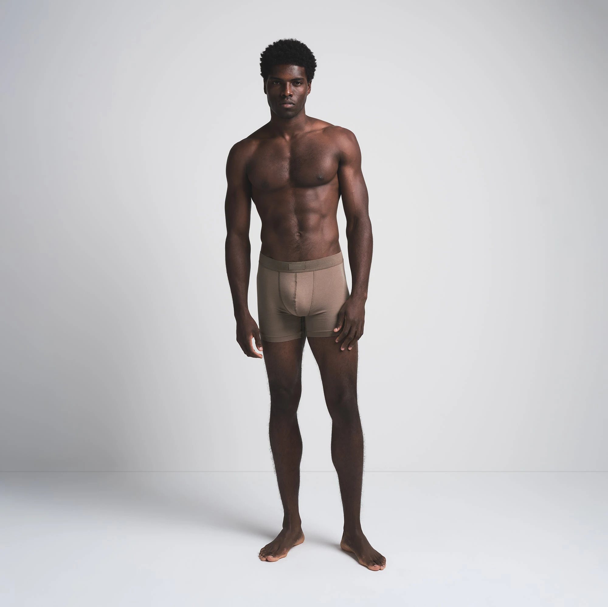 SKIMS COTTON MENS 3" BOXER BRIEF 3-PACK | MERLOT MULTI ON A MODEL FRONT VIEW