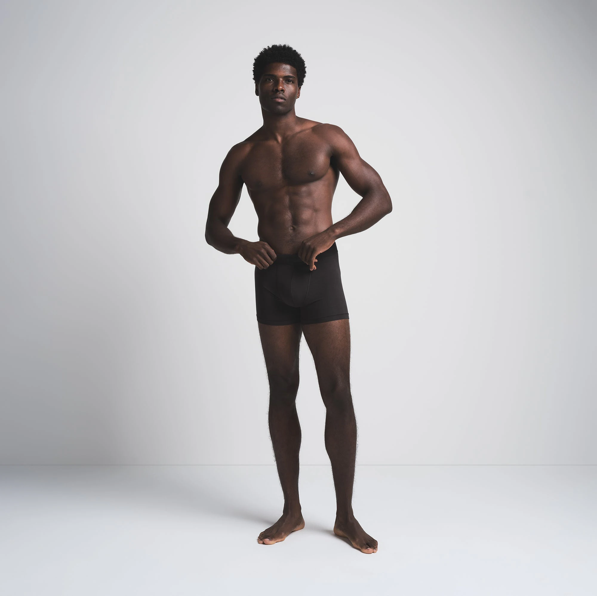 SKIMS COTTON MENS 3" BOXER BRIEF 3-PACK | MERLOT MULTI ON A MODEL FRONT VIEW