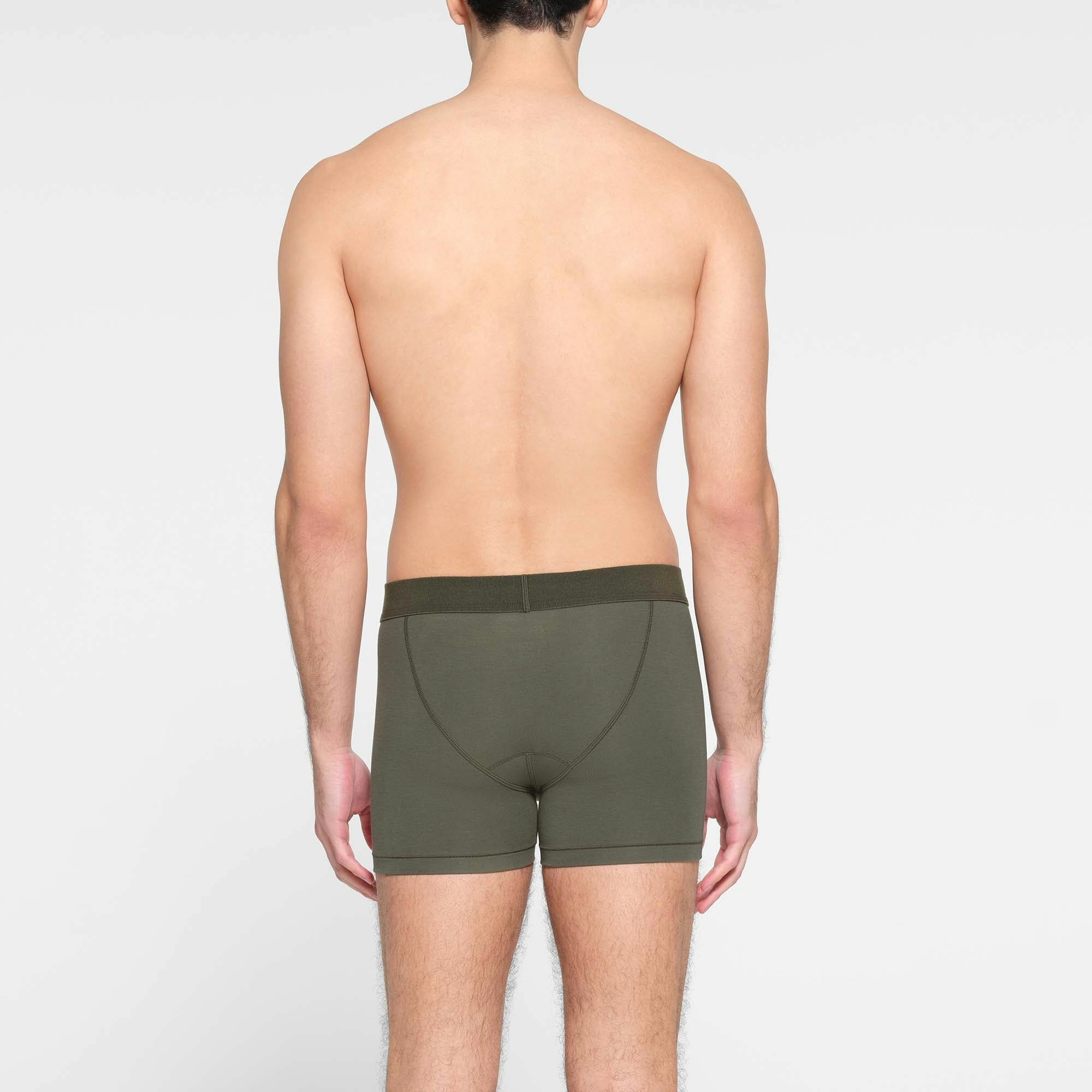SKIMS COTTON MENS 3" BOXER BRIEF 3-PACK | MILITARY MULTI ON A MODEL BACK VIEW