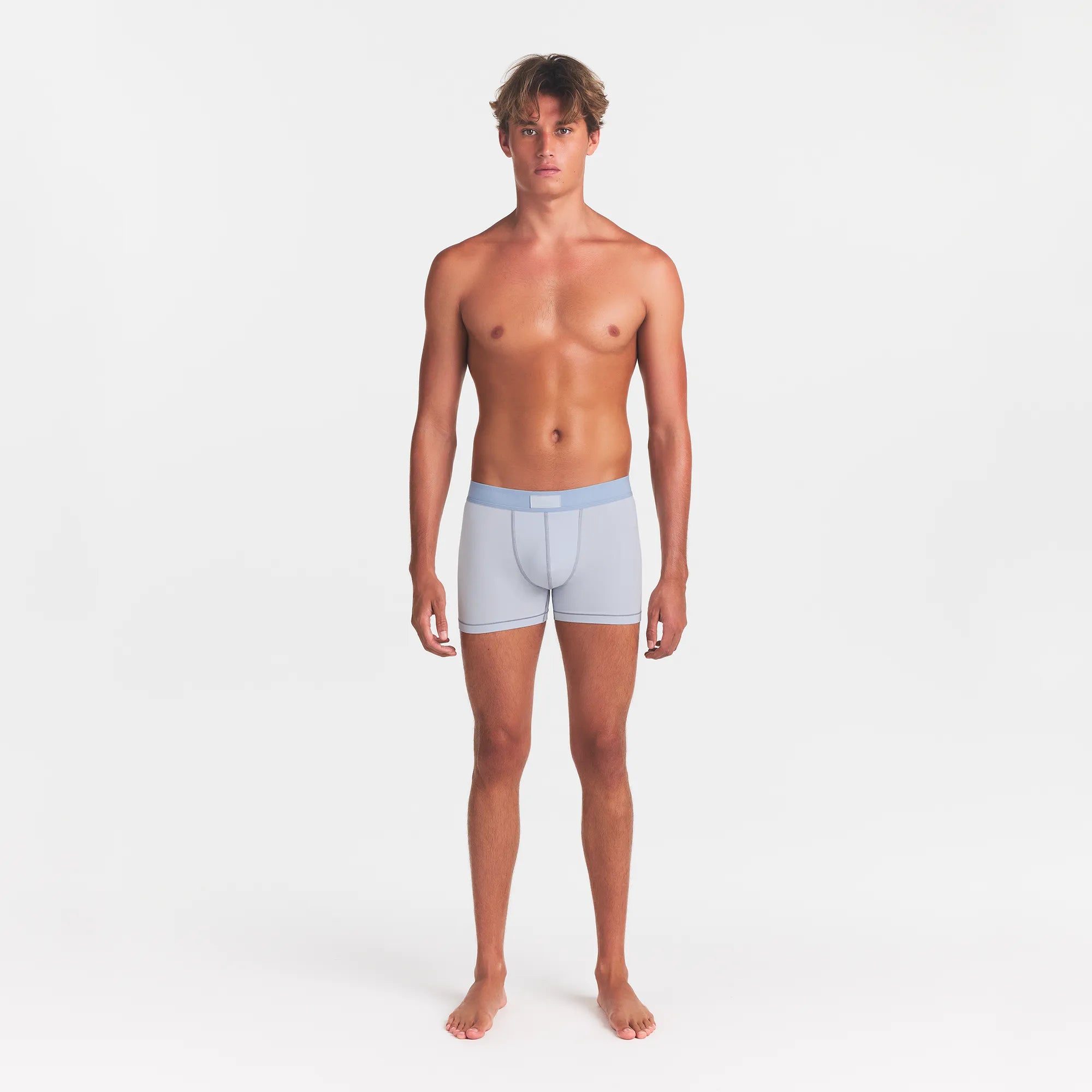 SKIMS COTTON MENS 3" BOXER BRIEF 3-PACK | NIMBUS MULTI ON A MODEL FRONT VIEW @ | FOCUS: 0.0, 1.0, 0.9