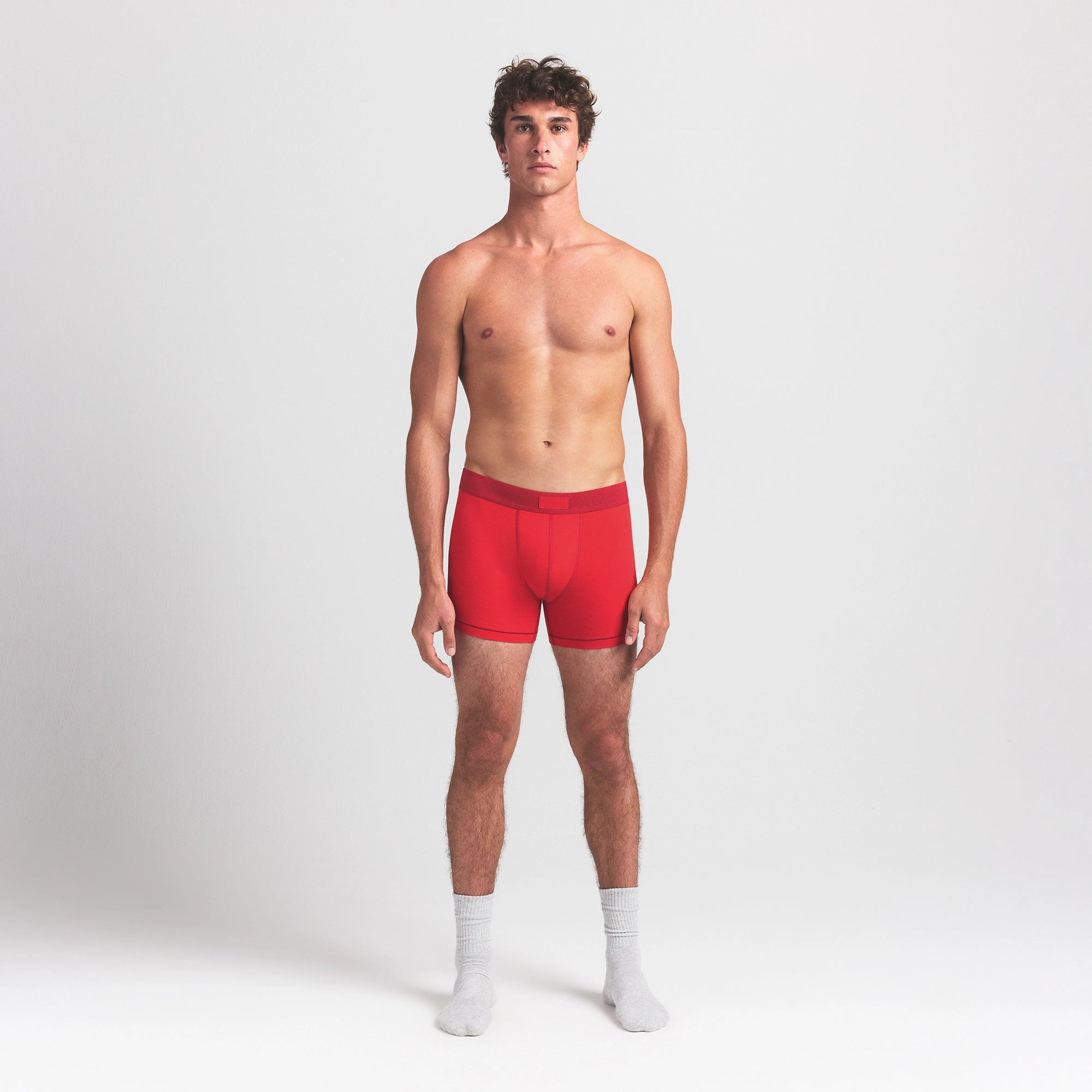 SKIMS COTTON MENS 3" BOXER BRIEF 3-PACK | RUBY ESPRESSO MULTI ON A MODEL FRONT VIEW @ | FOCUS: 0.0, 1.0, 0.9