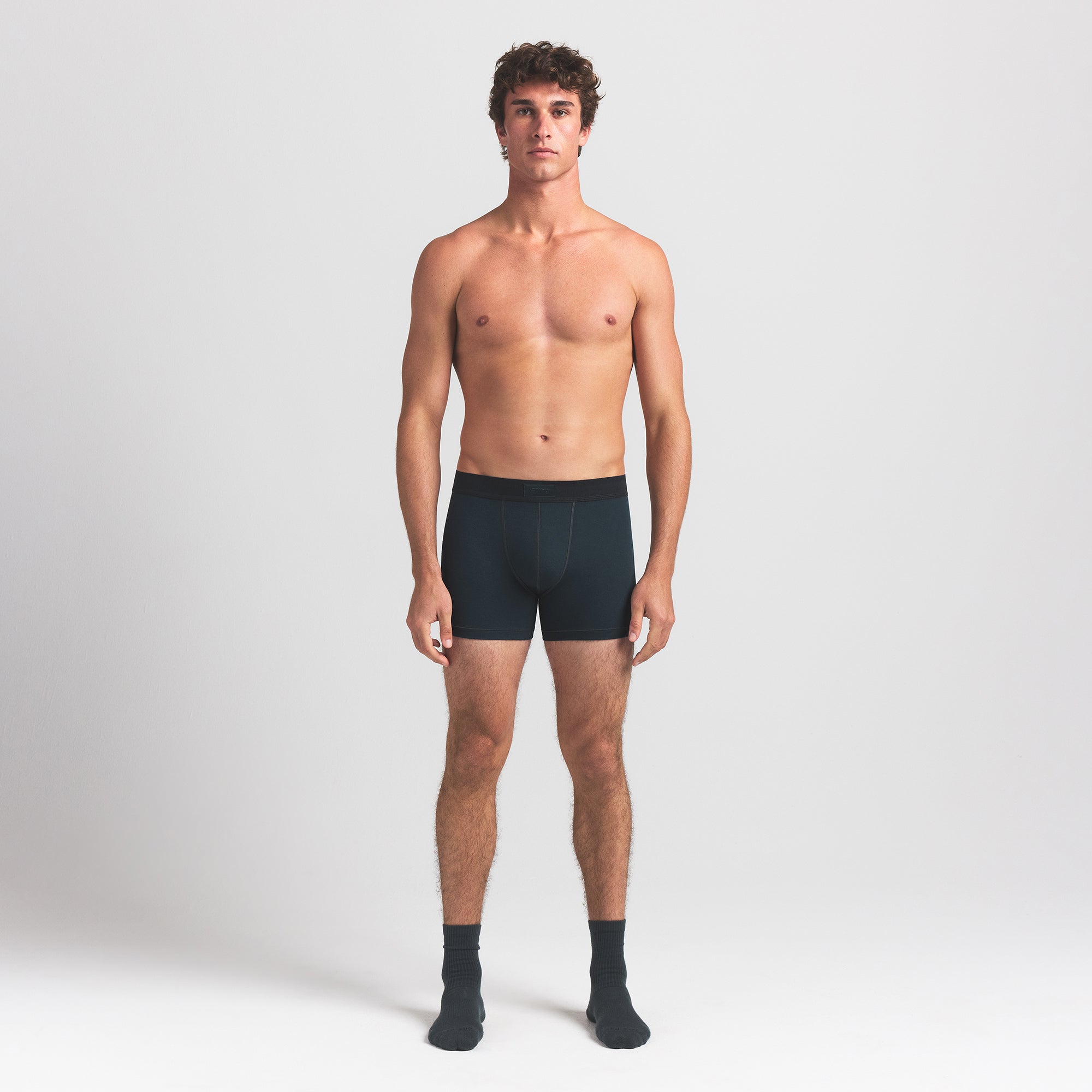 SKIMS COTTON MENS 3" BOXER BRIEF 3-PACK | VERDANT MULTI ON A MODEL FRONT VIEW @ | FOCUS: 0.0, 1.0, 0.9