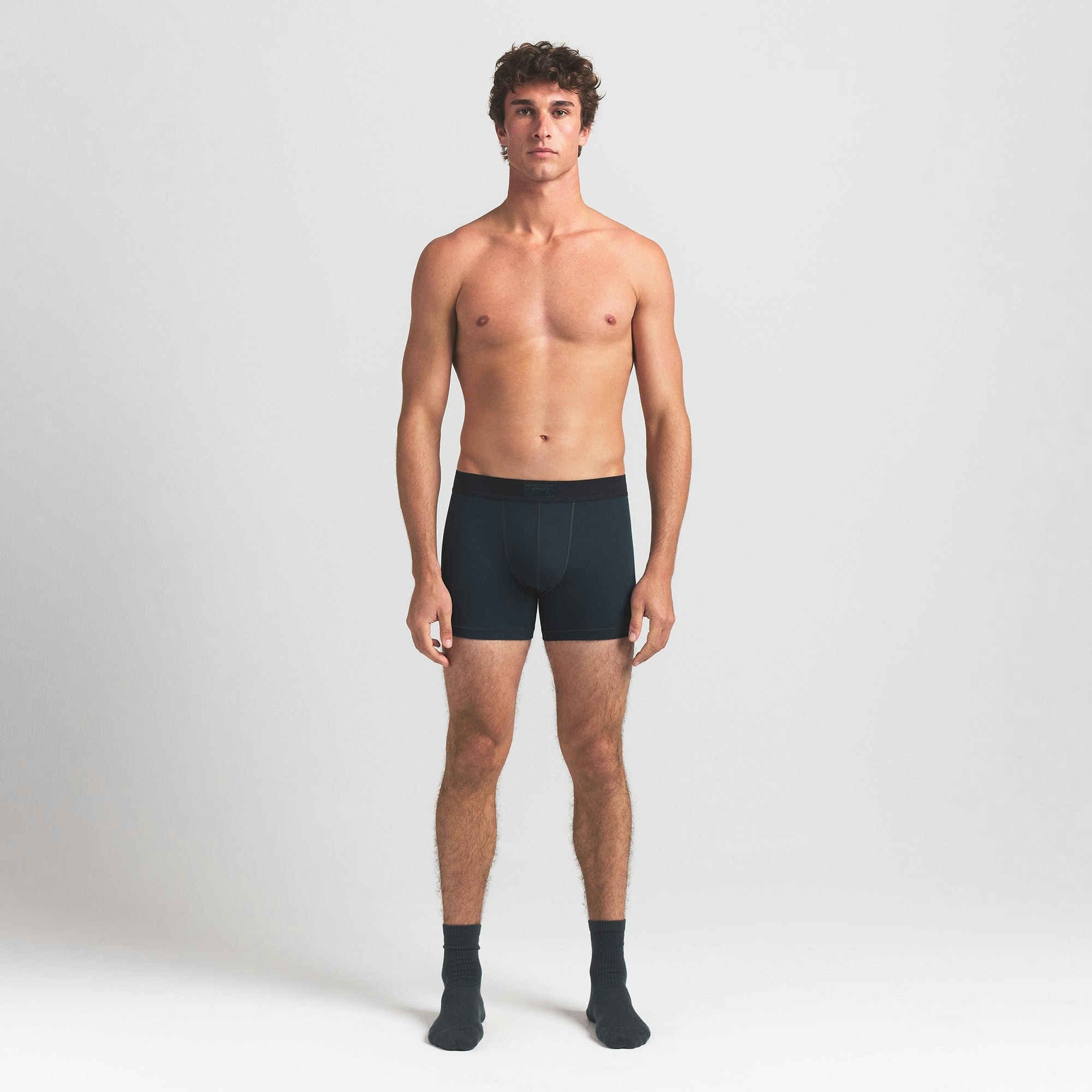 SKIMS COTTON MENS 3" BOXER BRIEF 3-PACK | VERDANT MULTI ON A MODEL FRONT VIEW @ | FOCUS: 0.0, 1.0, 0.9