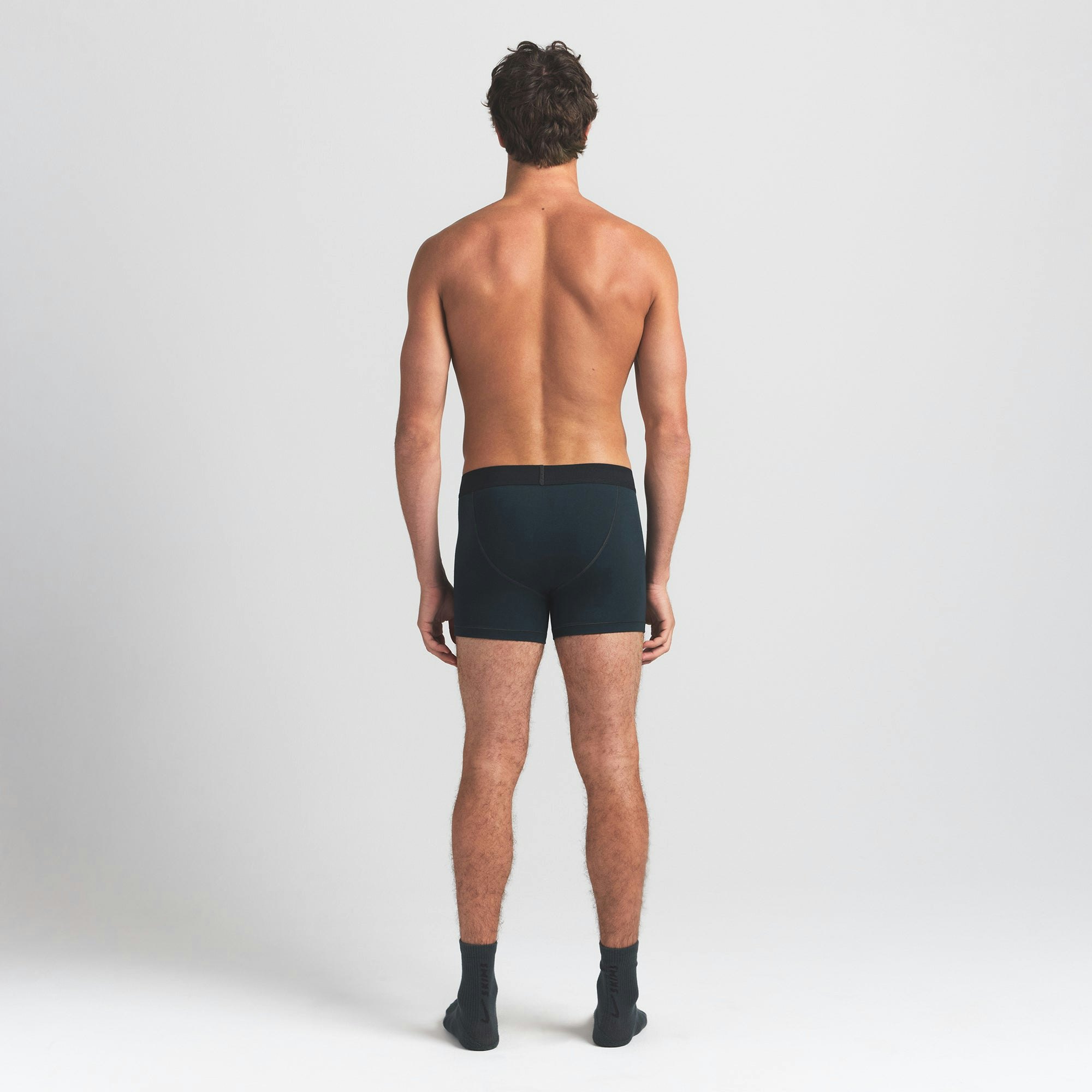 SKIMS COTTON MENS 3" BOXER BRIEF 3-PACK | VERDANT MULTI ON A MODEL BACK VIEW @ | FOCUS: 0.0, 1.0, 0.9