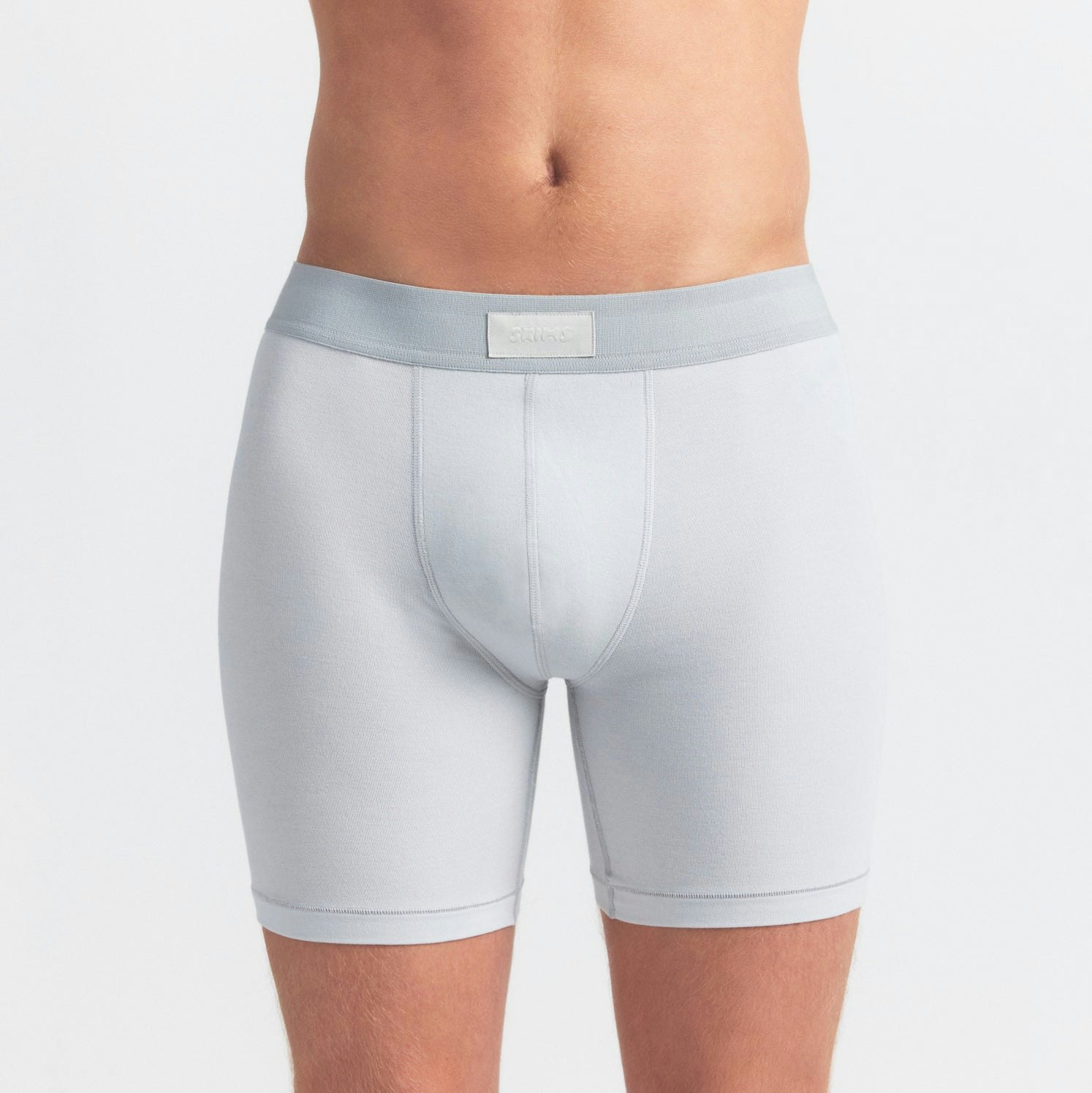 SKIMS COTTON MENS 5" BOXER BRIEF 3-PACK | BLUE BLACK MULTI ON A MODEL SIDE VIEW @ | FOCUS: 0.0, 1.0, 0.9