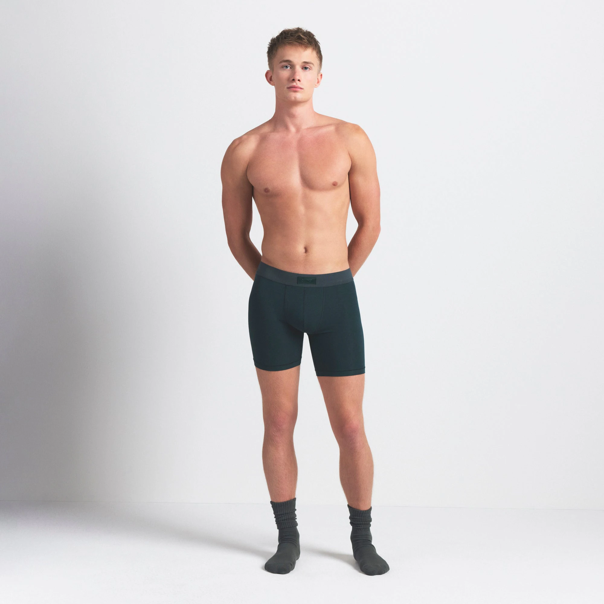 SKIMS COTTON MENS 5" BOXER BRIEF 3-PACK | BLUE BLACK MULTI ON A MODEL FRONT VIEW @ | FOCUS: 0.0, 1.0, 0.9
