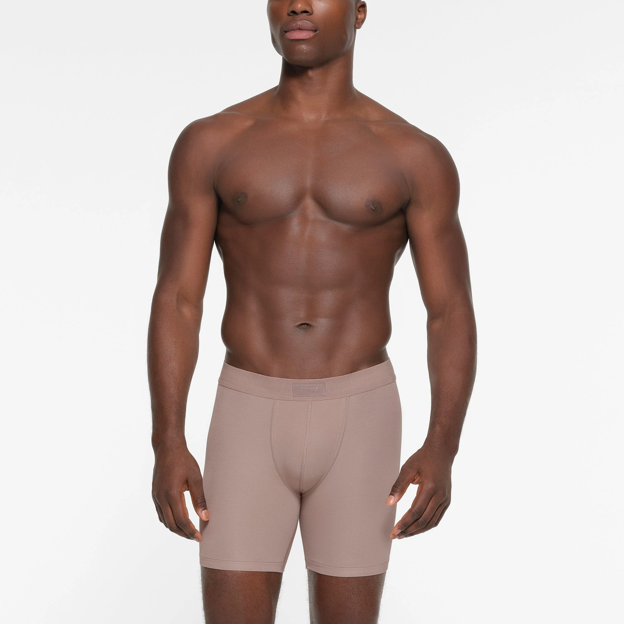 SKIMS COTTON MENS 5 INCH BOXER BRIEF 3 PACK | FAWN MULTI ON A MODEL FRONT VIEW