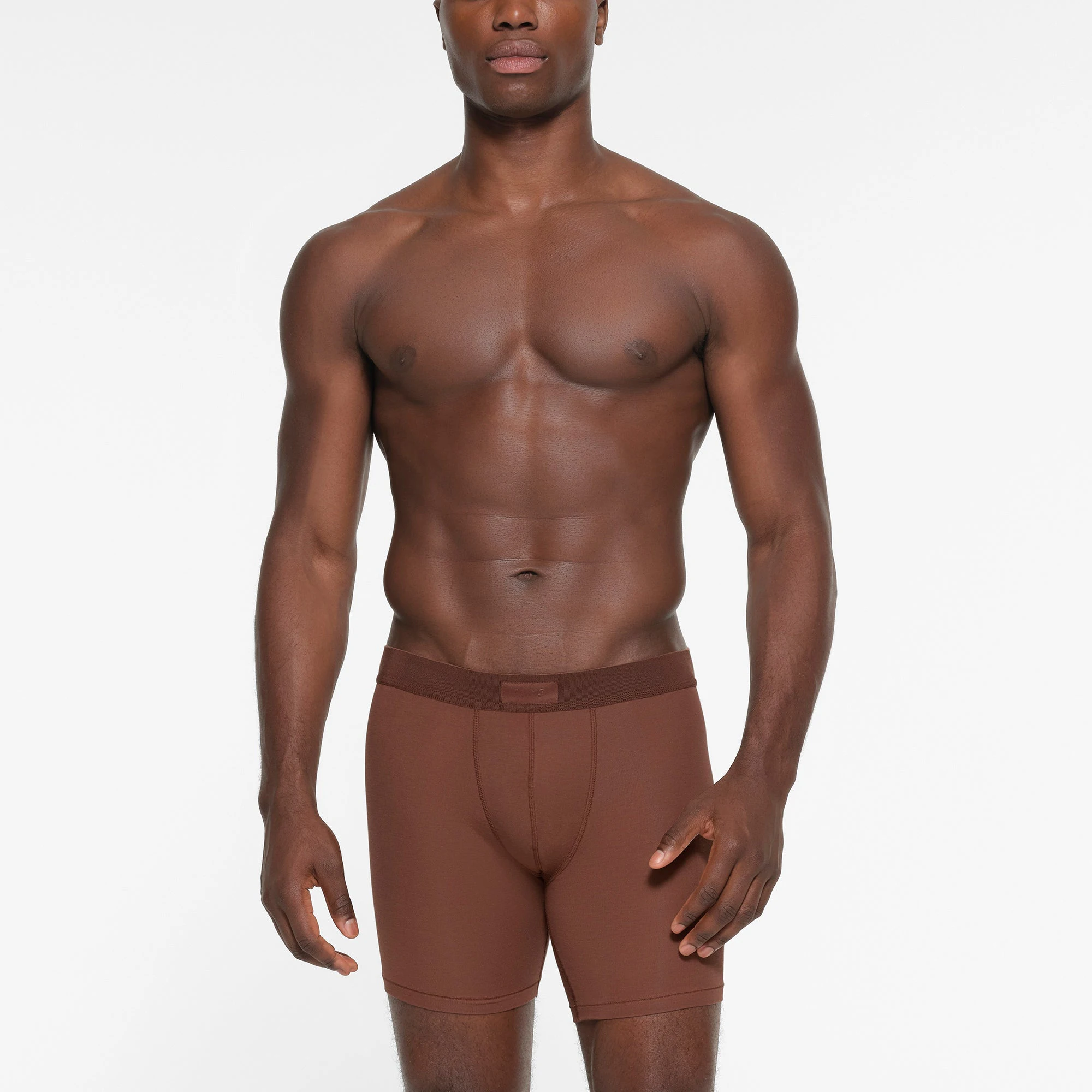 SKIMS COTTON MENS 5 INCH BOXER BRIEF 3 PACK | FAWN MULTI ON A MODEL FRONT VIEW