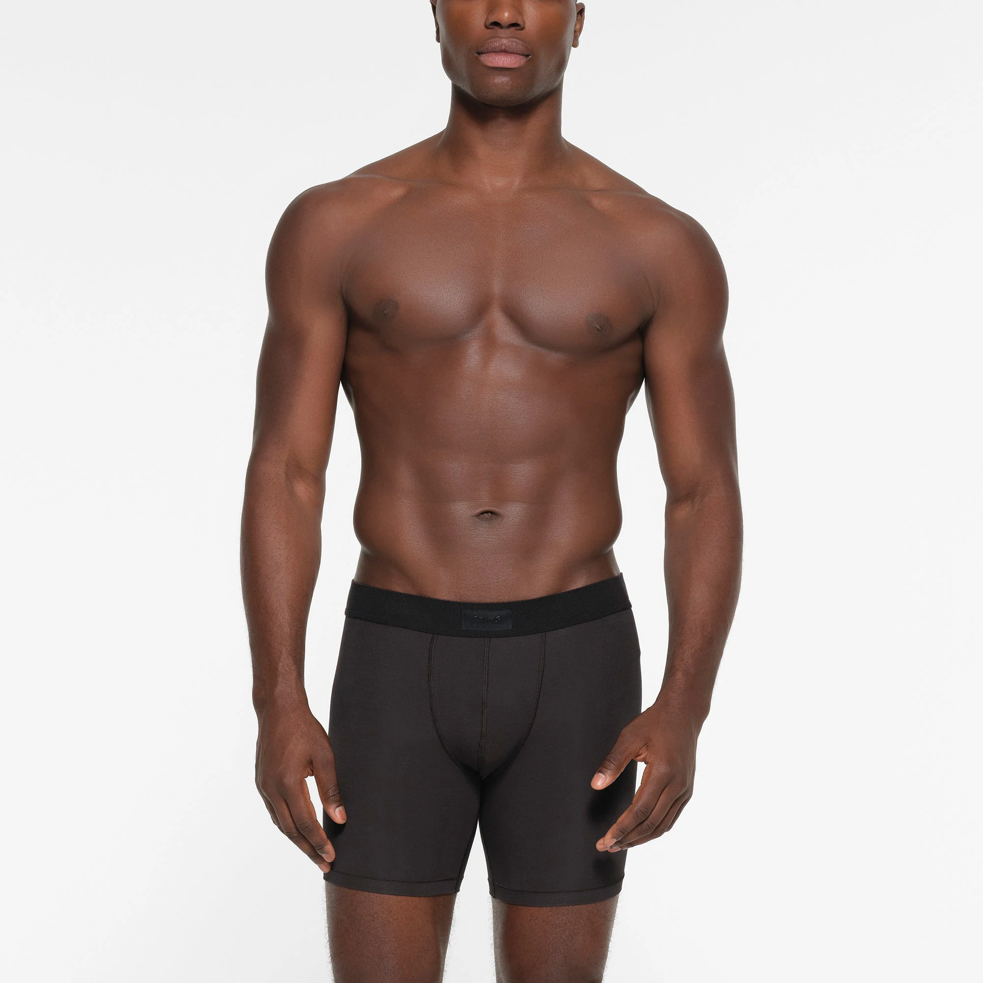 SKIMS COTTON MENS 5 INCH BOXER BRIEF 3 PACK | FAWN MULTI ON A MODEL FRONT VIEW