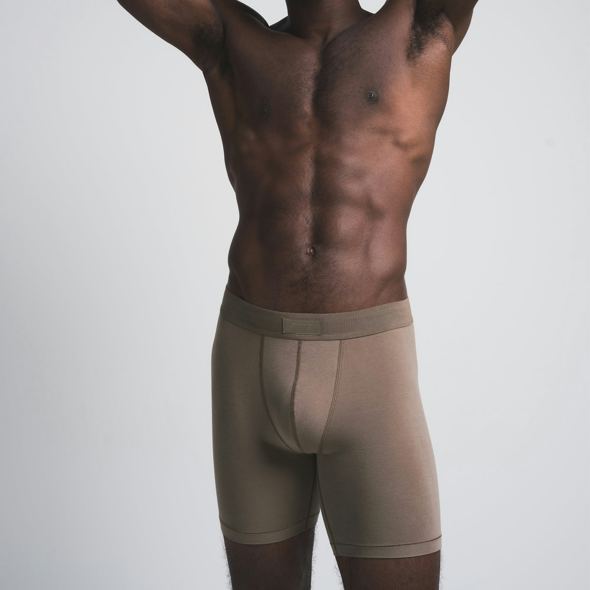 SKIMS COTTON MENS 5" BOXER BRIEF 3-PACK | MERLOT MULTI ON A MODEL SIDE VIEW