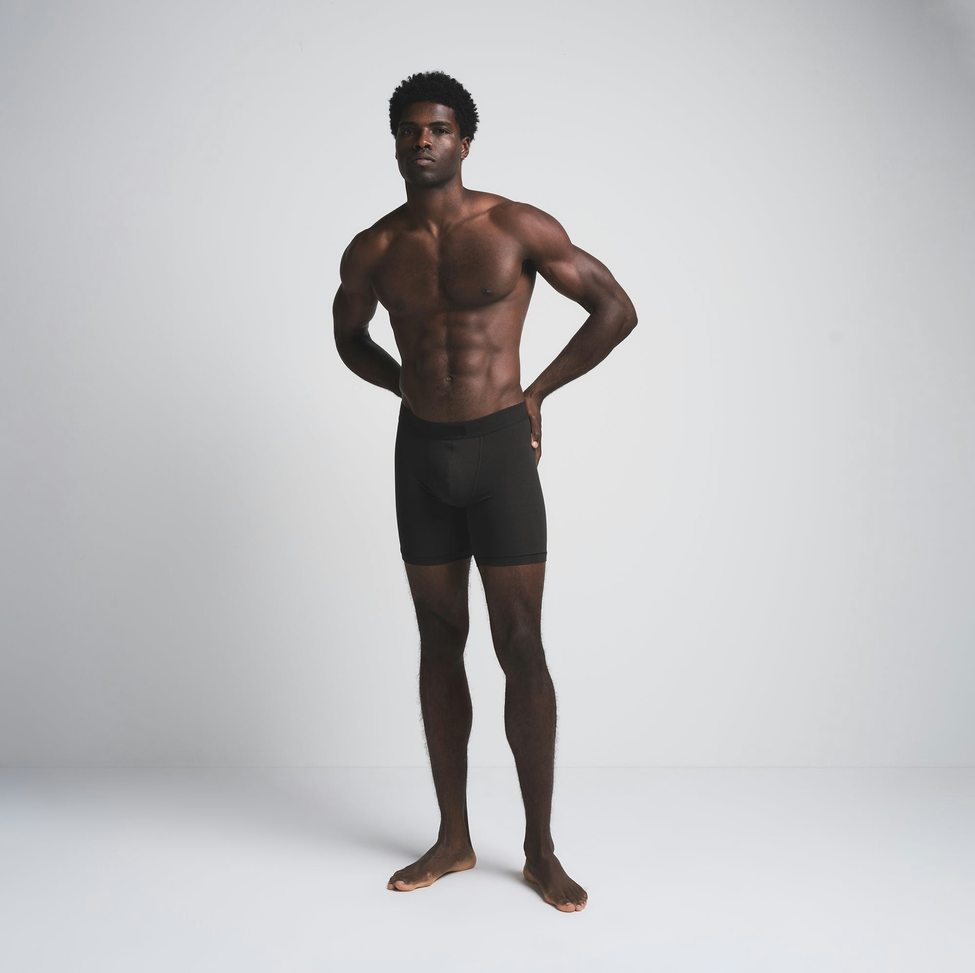 SKIMS COTTON MENS 5" BOXER BRIEF 3-PACK | MERLOT MULTI ON A MODEL FRONT VIEW