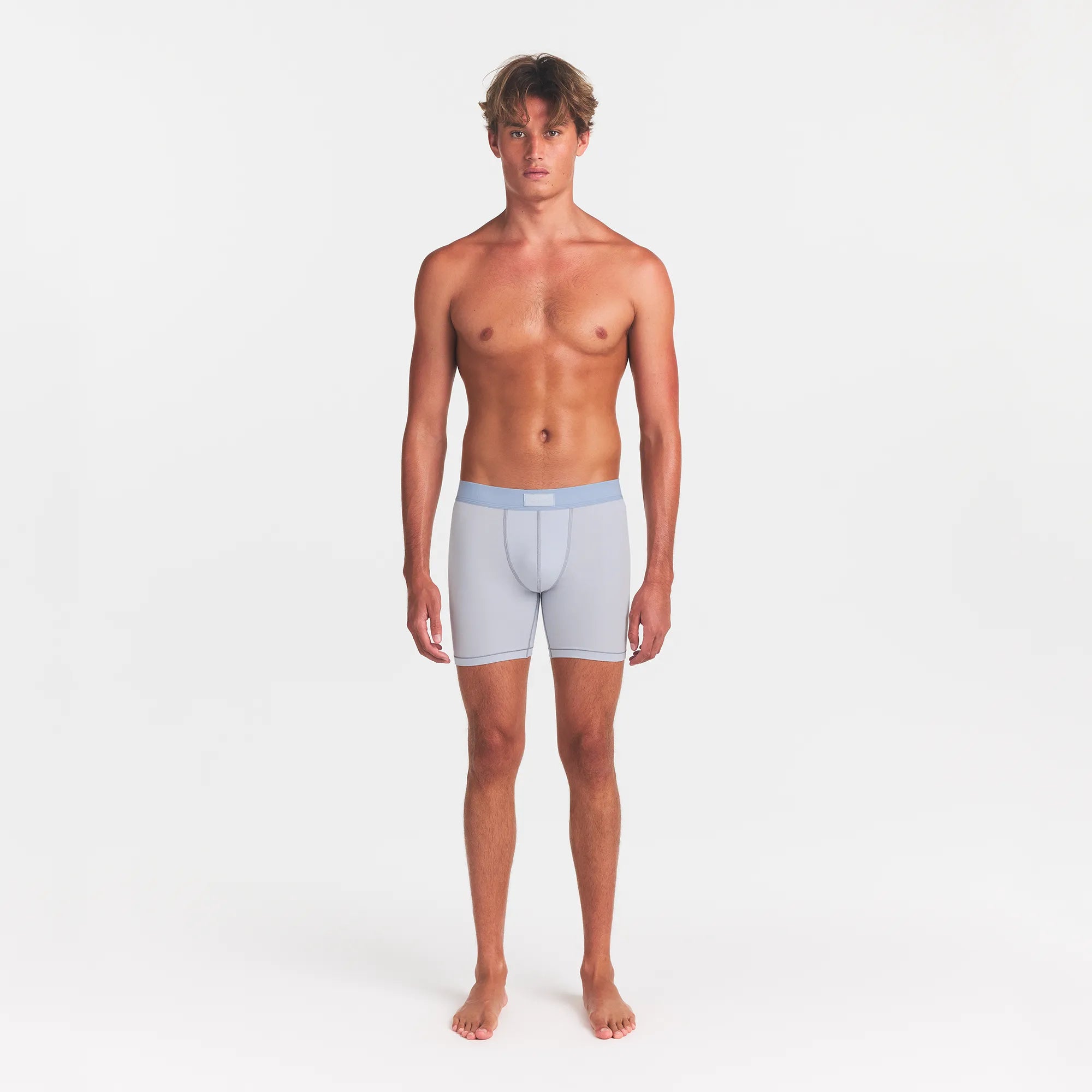 SKIMS COTTON MENS 5" BOXER BRIEF 3-PACK | NIMBUS MULTI ON A MODEL FRONT VIEW @ | FOCUS: 0.0, 1.0, 0.9