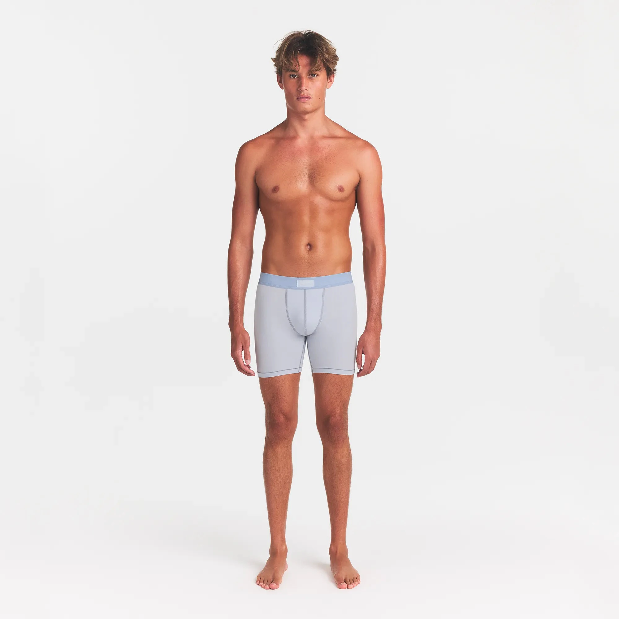 SKIMS COTTON MENS 5" BOXER BRIEF 3-PACK | NIMBUS MULTI ON A MODEL FRONT VIEW @ | FOCUS: 0.0, 1.0, 0.9