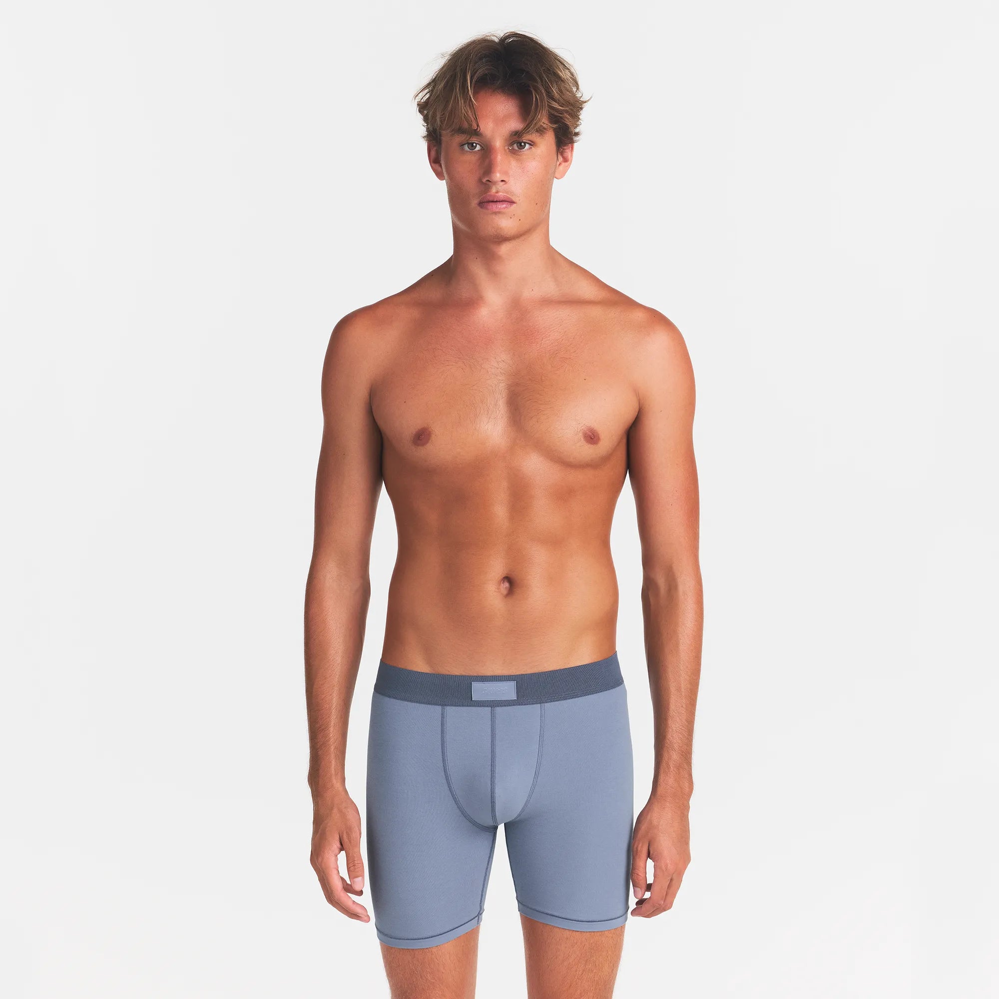 SKIMS COTTON MENS 5" BOXER BRIEF 3-PACK | NIMBUS MULTI ON A MODEL FRONT VIEW