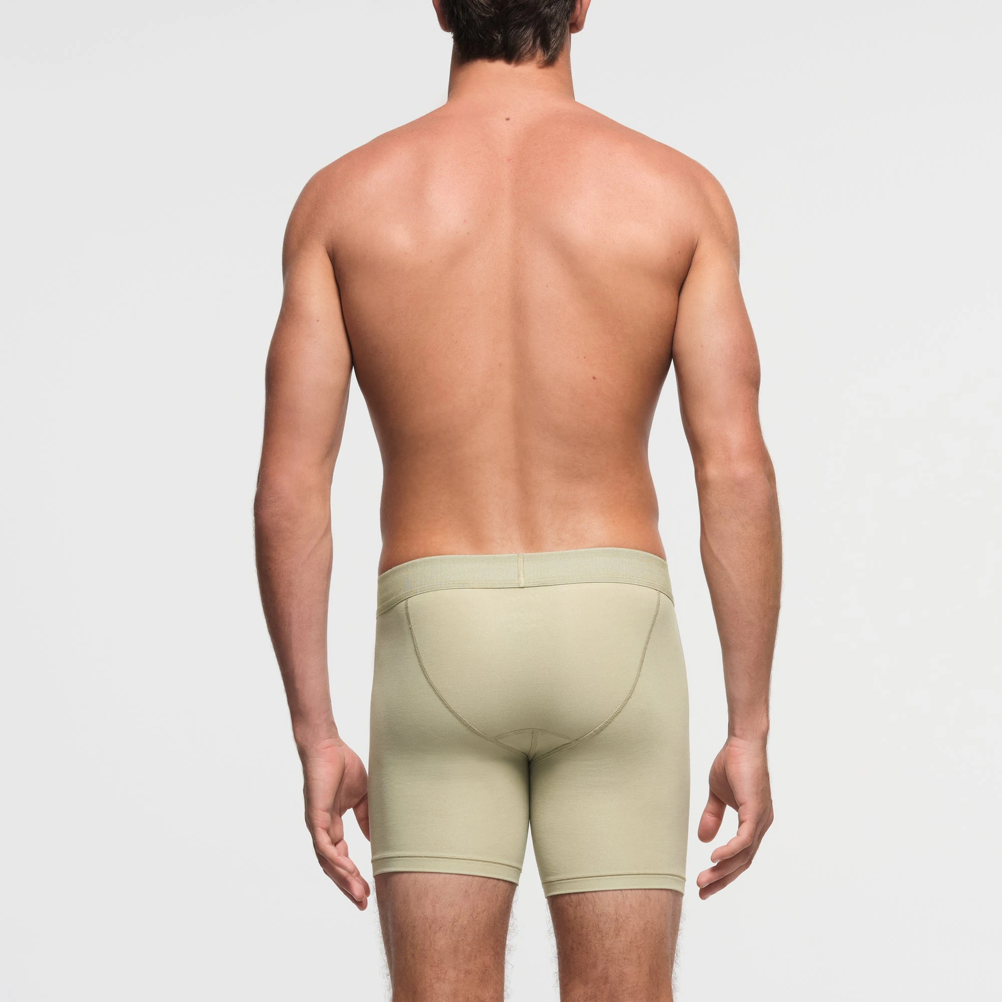 SKIMS COTTON MENS 5" BOXER BRIEF | PHOSPHORUS ON A MODEL BACK VIEW