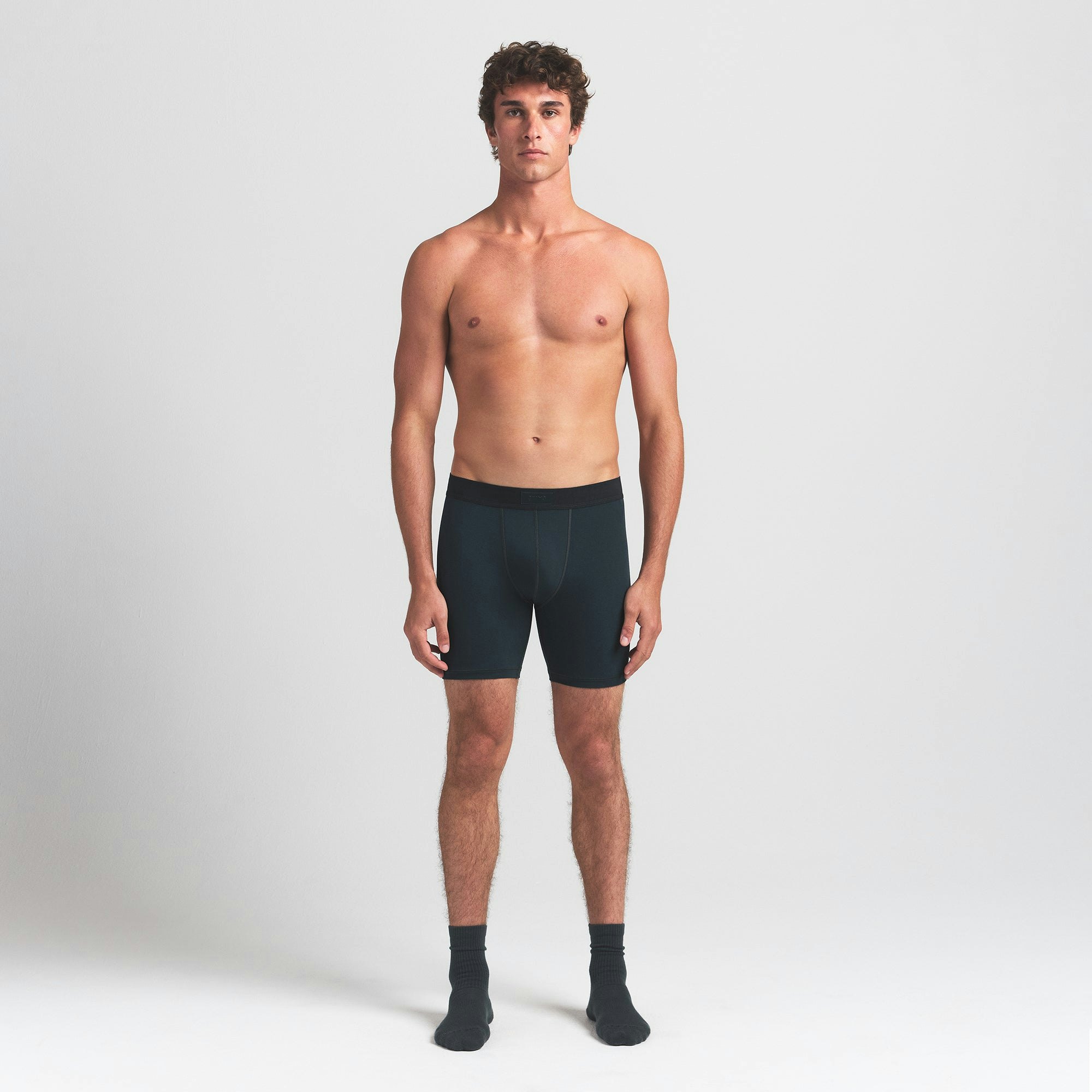 SKIMS COTTON MENS 5" BOXER BRIEF 3-PACK | VERDANT MULTI ON A MODEL FRONT VIEW @ | FOCUS: 0.0, 1.0, 0.9