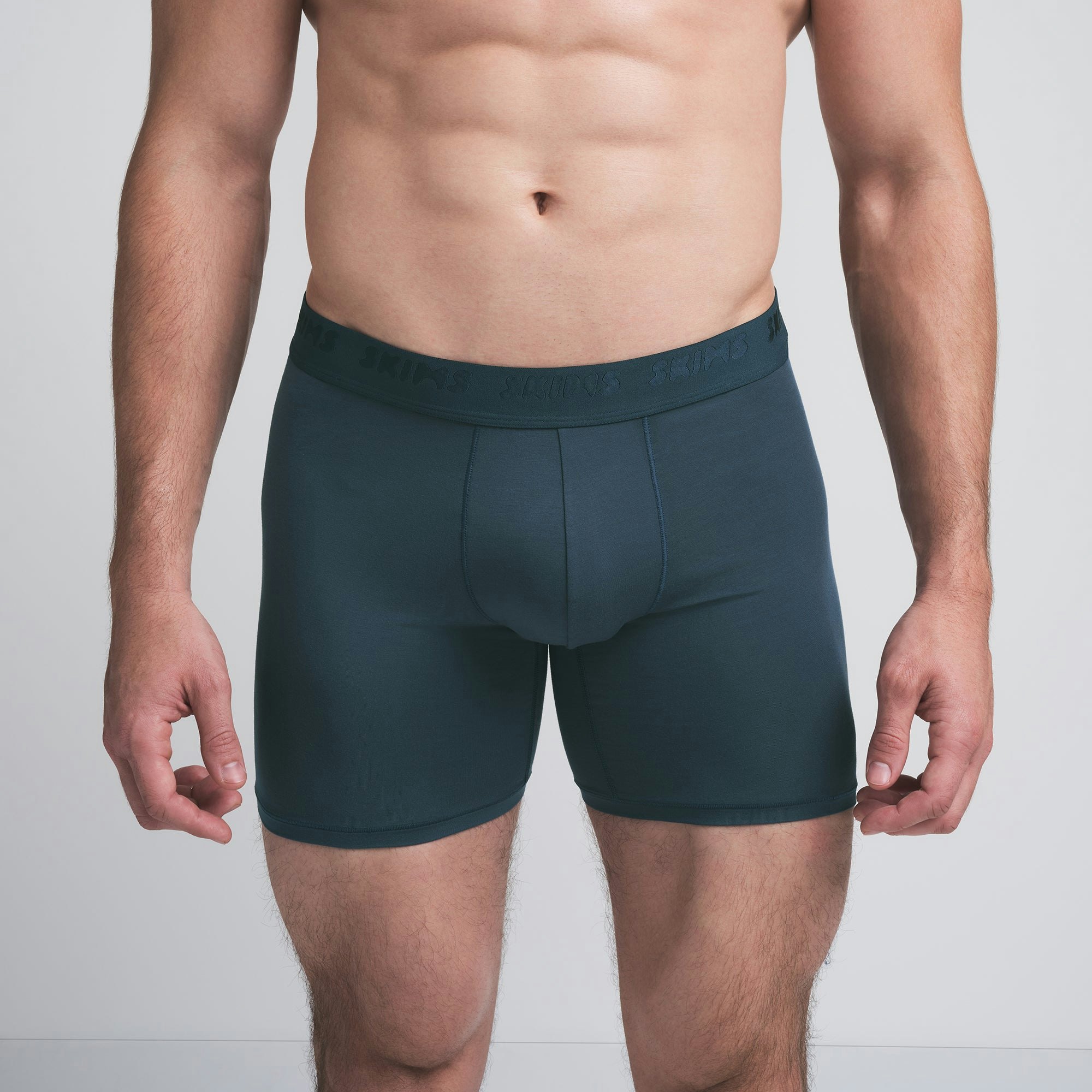 SKIMS STRETCH MENS 5 INCH BOXER BRIEF 5-PACK | DESERT INDIGO MULTI ON A MODEL FRONT VIEW | FOCUS: 0.0, 1.0, 0.9