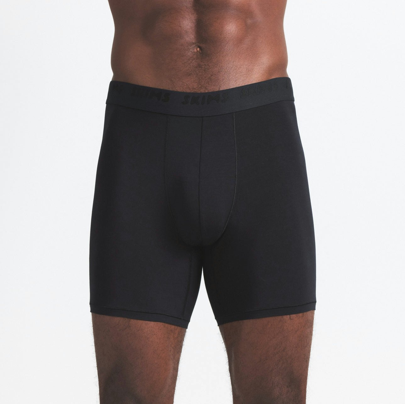 SKIMS STRETCH MENS 5" BOXER BRIEF 5-PACK | WOOD RIO MULTI ON A MODEL SIDE VIEW @ | FOCUS: 0.0, 1.0, 0.9