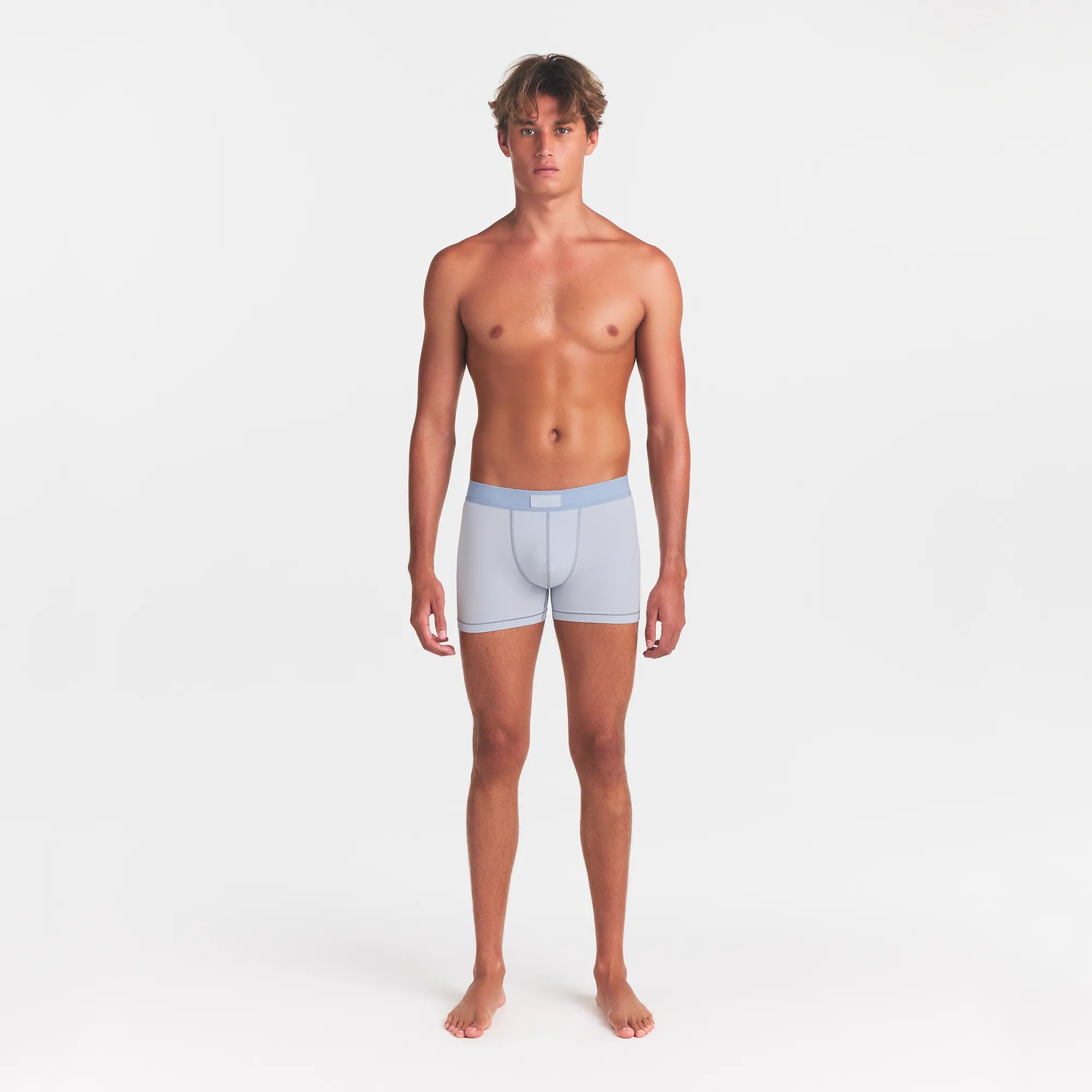 SKIMS COTTON MENS 3" BOXER BRIEF 5-PACK | ATMOSPHERE MULTI ON A MODEL FRONT VIEW @ | FOCUS: 0.0, 1.0, 0.9