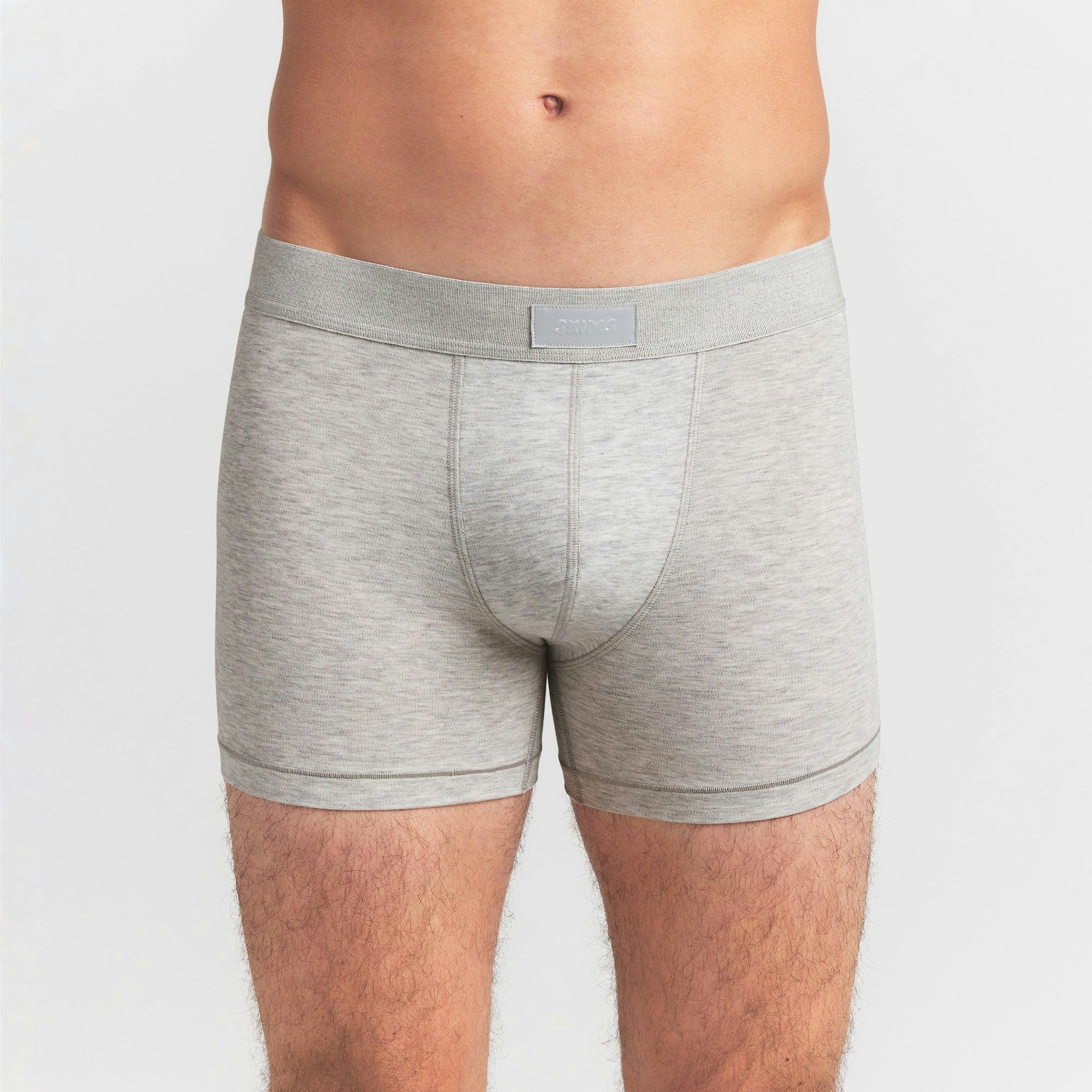 SKIMS COTTON MENS 3" BOXER BRIEF 5-PACK | VERDANT SKY MULTI ON A MODEL FRONT VIEW @ | FOCUS: 0.0, 1.0, 0.9