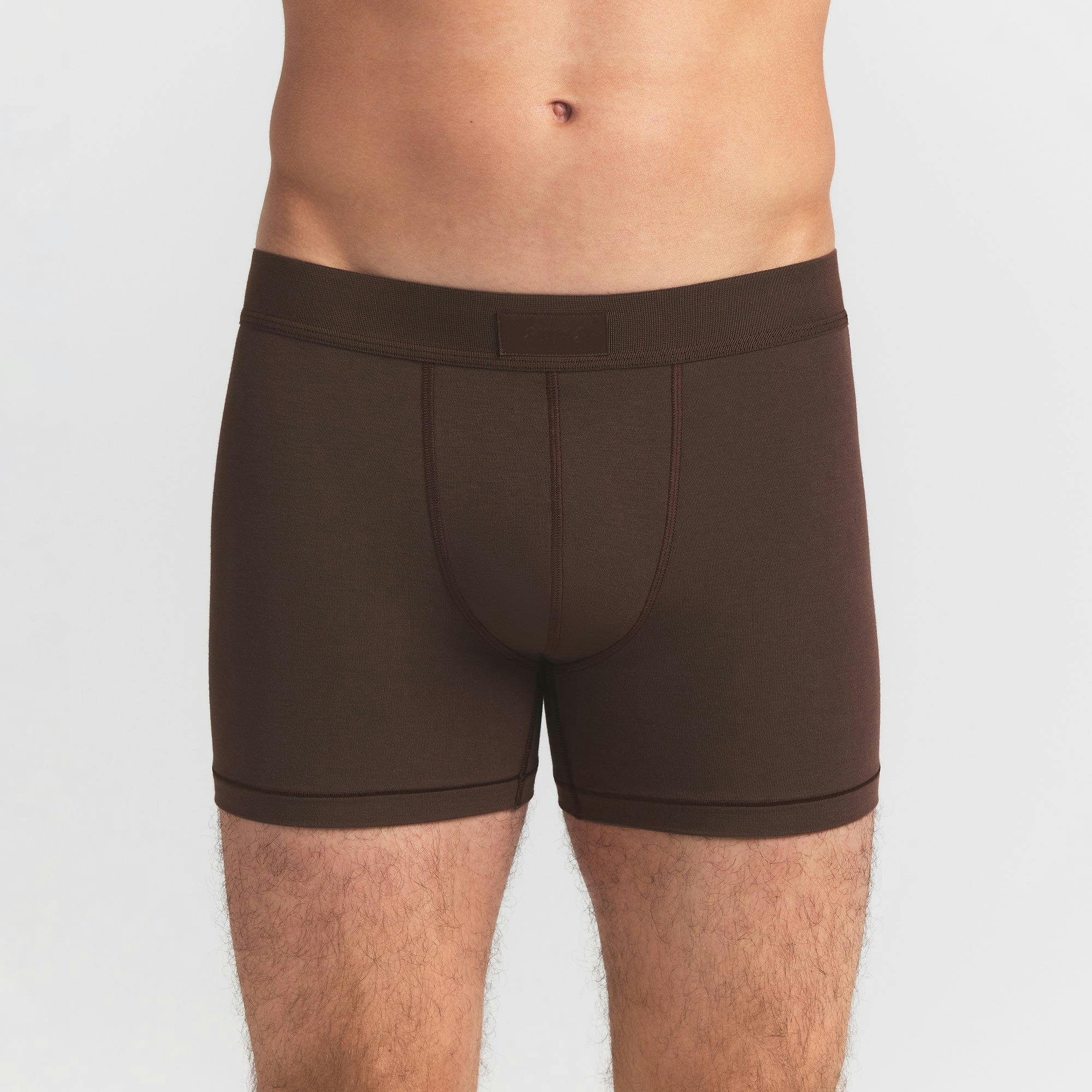 SKIMS COTTON MENS 3" BOXER BRIEF 5-PACK | VERDANT SKY MULTI ON A MODEL FRONT VIEW @ | FOCUS: 0.0, 1.0, 0.9