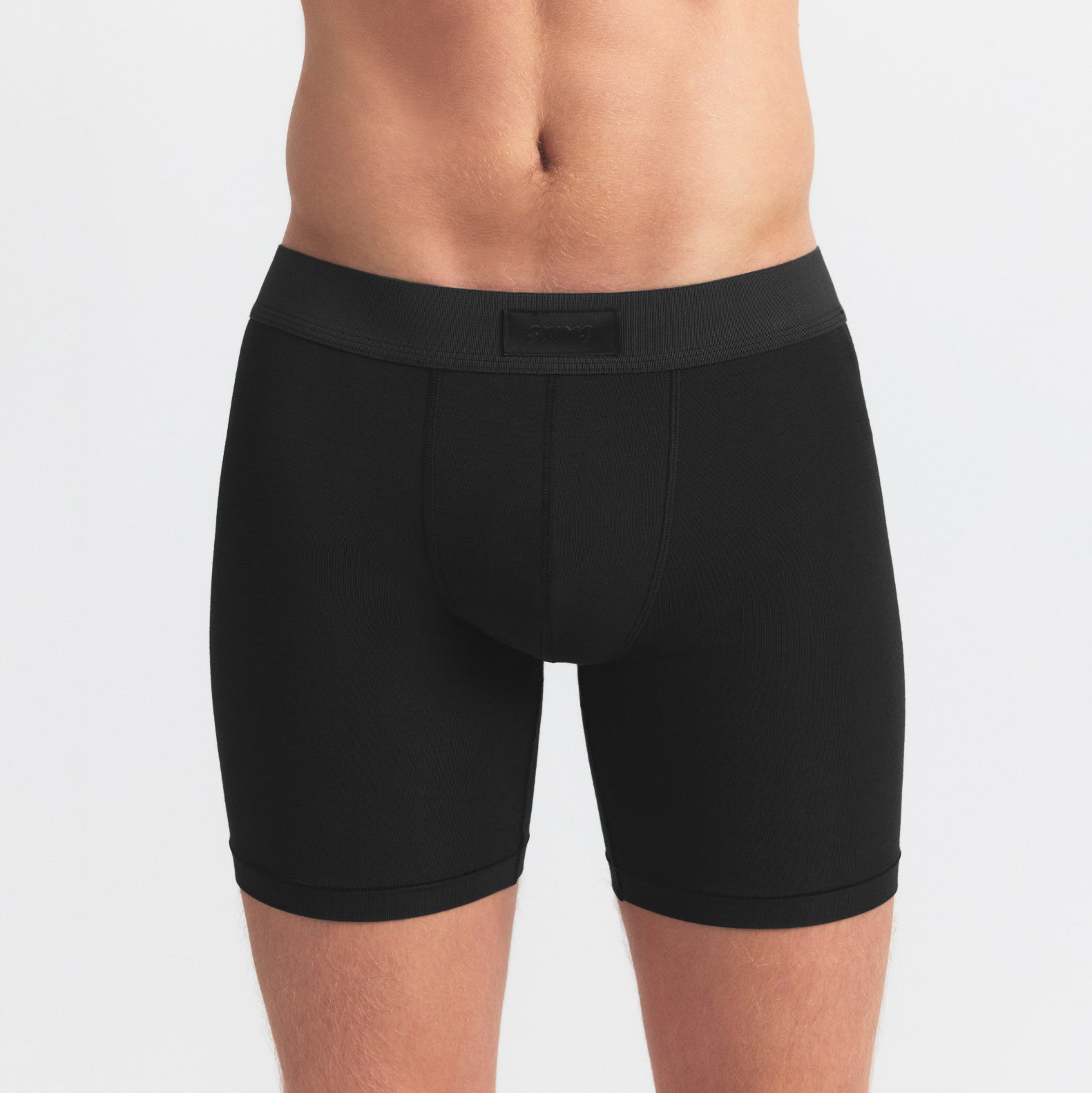 SKIMS COTTON MENS 5" BOXER BRIEF 5-PACK | BLUE BLACK STONE MULTI ON A MODEL SIDE VIEW @ | FOCUS: 0.0, 1.0, 0.9