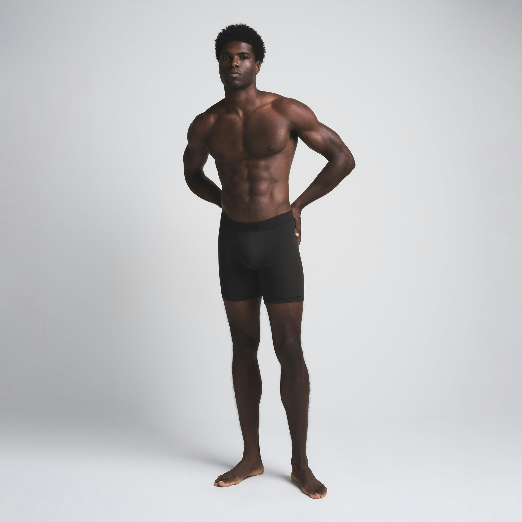 SKIMS COTTON MENS 5" BOXER BRIEF 5-PACK | HEATHER MULTI (MENS BOXERS) ON A MODEL FRONT VIEW