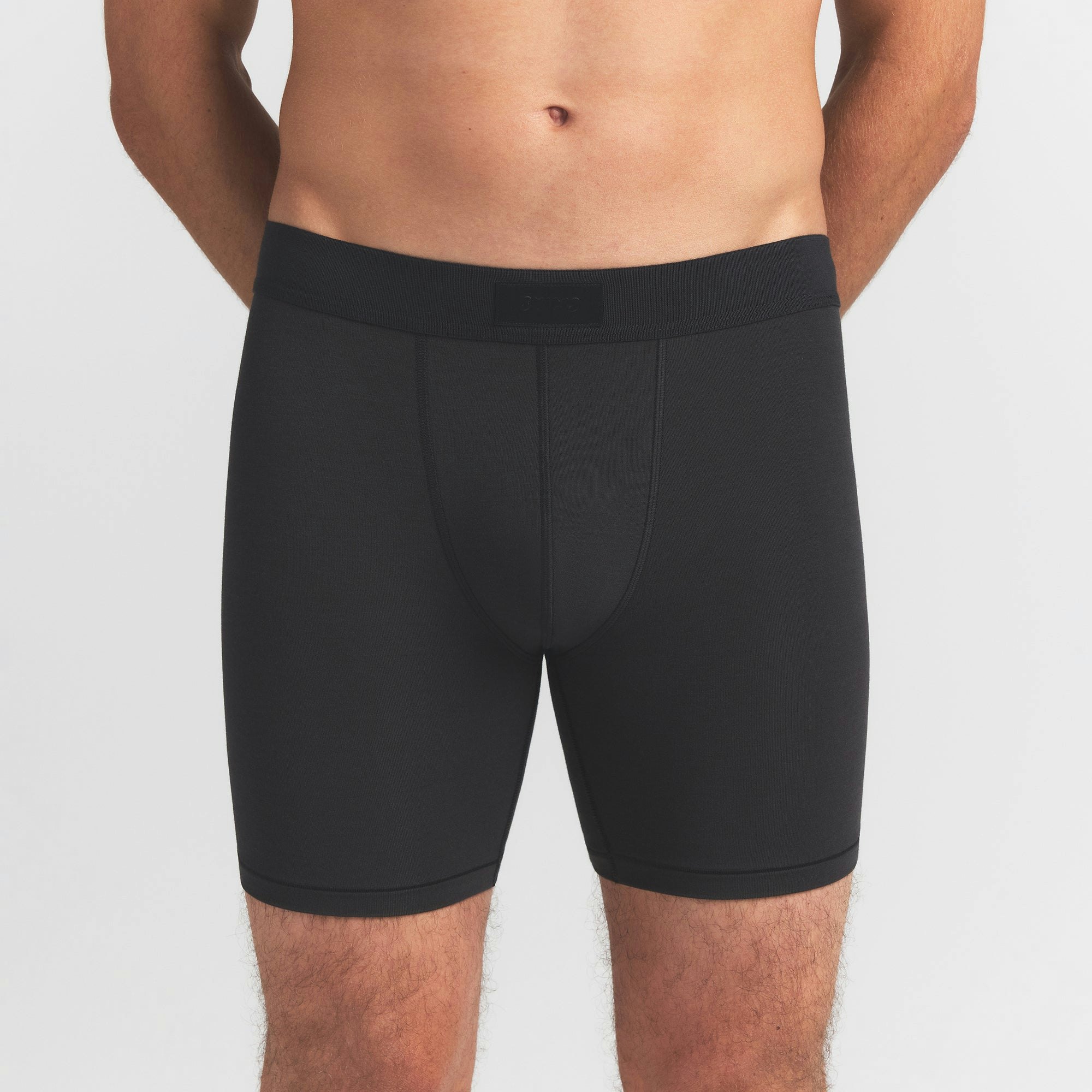 SKIMS COTTON MENS 5" BOXER BRIEF 5-PACK | VERDANT SKY MULTI ON A MODEL FRONT VIEW @ | FOCUS: 0.0, 1.0, 0.9