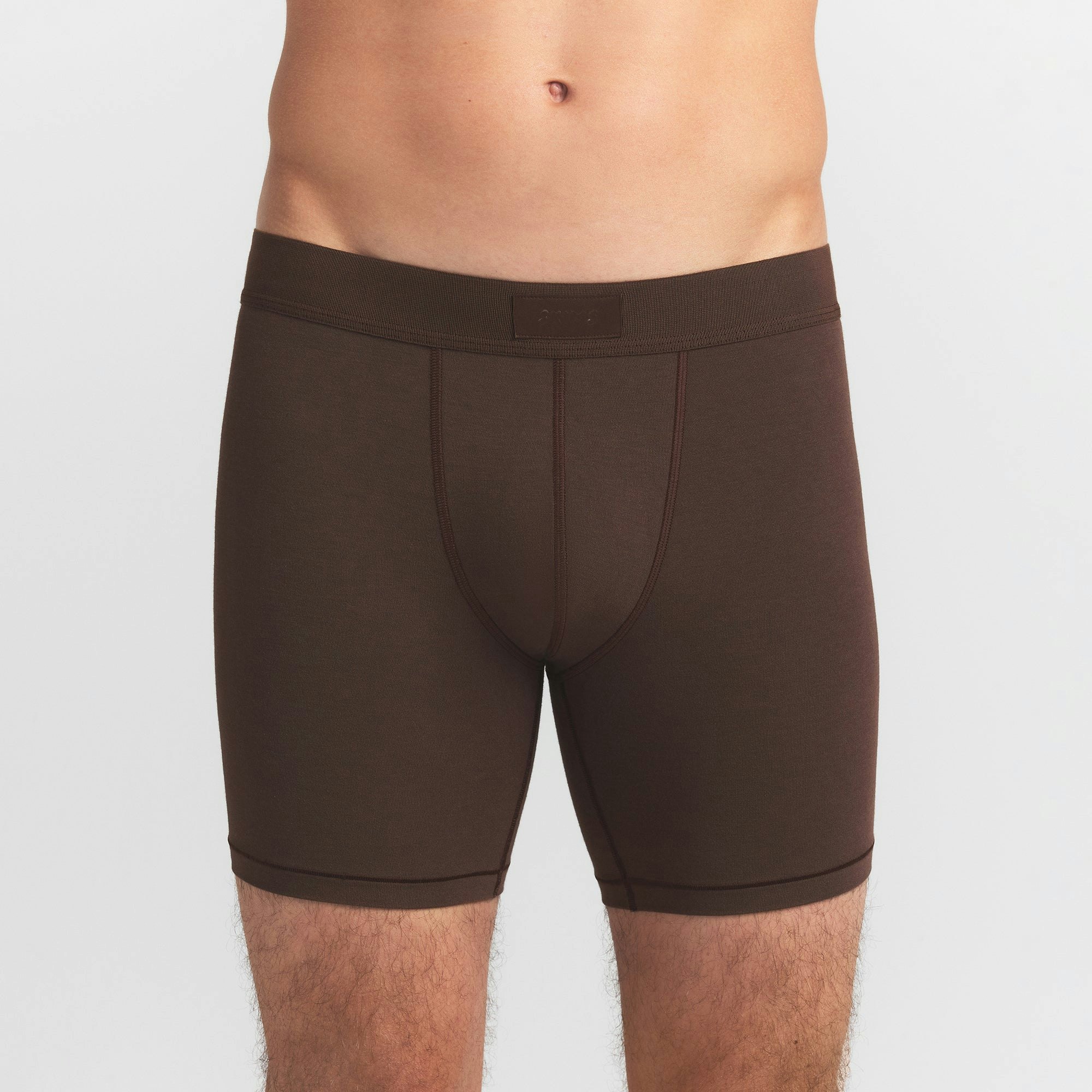 SKIMS COTTON MENS 5" BOXER BRIEF 5-PACK | VERDANT SKY MULTI ON A MODEL FRONT VIEW @ | FOCUS: 0.0, 1.0, 0.9