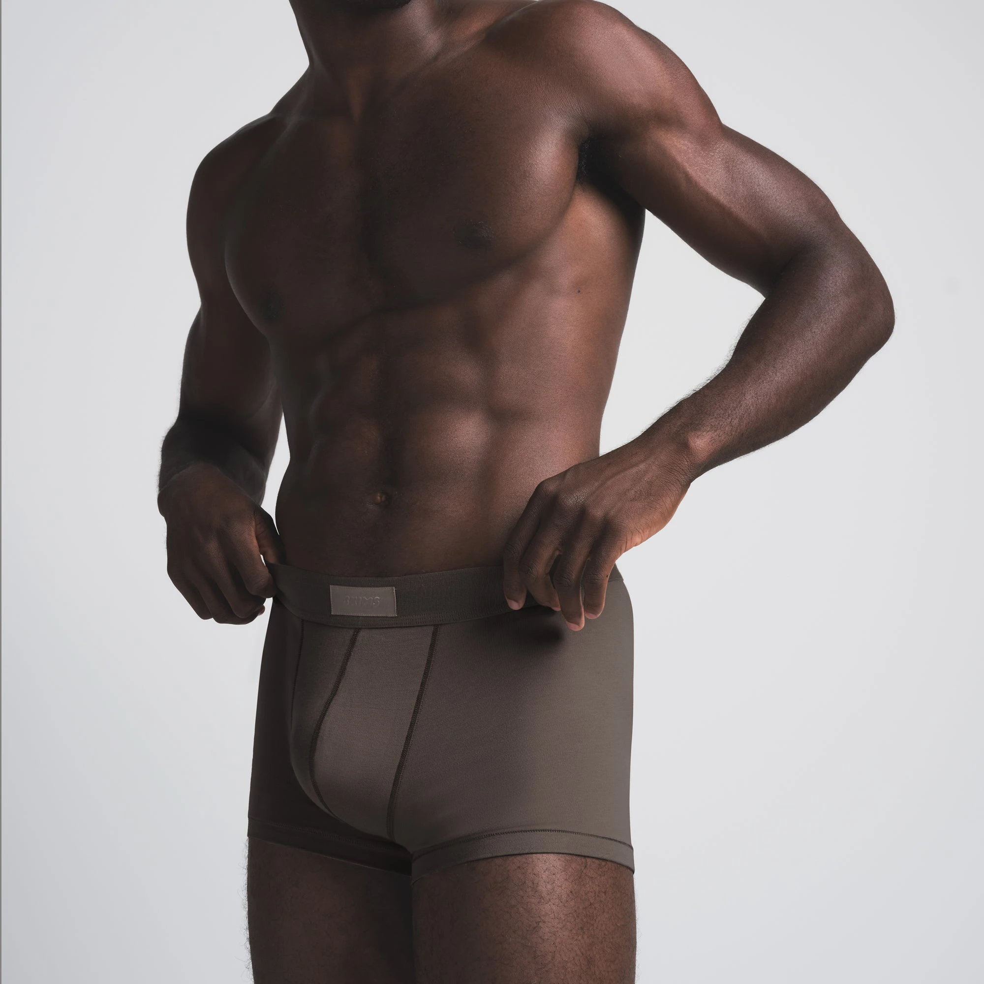 SKIMS COTTON MENS TRUNK | AMETHYST ON A MODEL SIDE VIEW