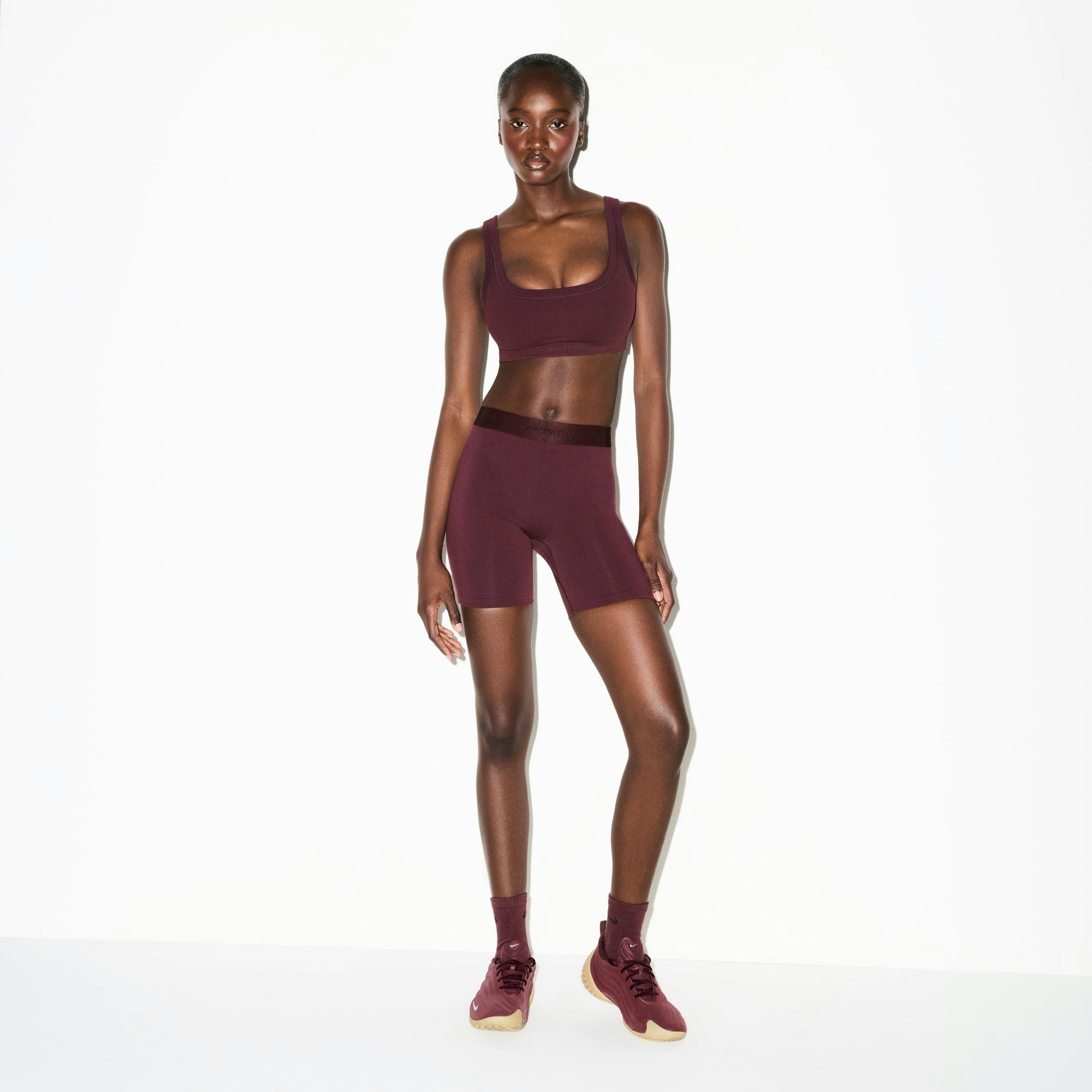 NikeSKIMS VINTAGE SEAMLESS 5" SHORT | CURRANT ON A MODEL FRONT VIEW @ | FOCUS: 0.0, 1.0, 0.9