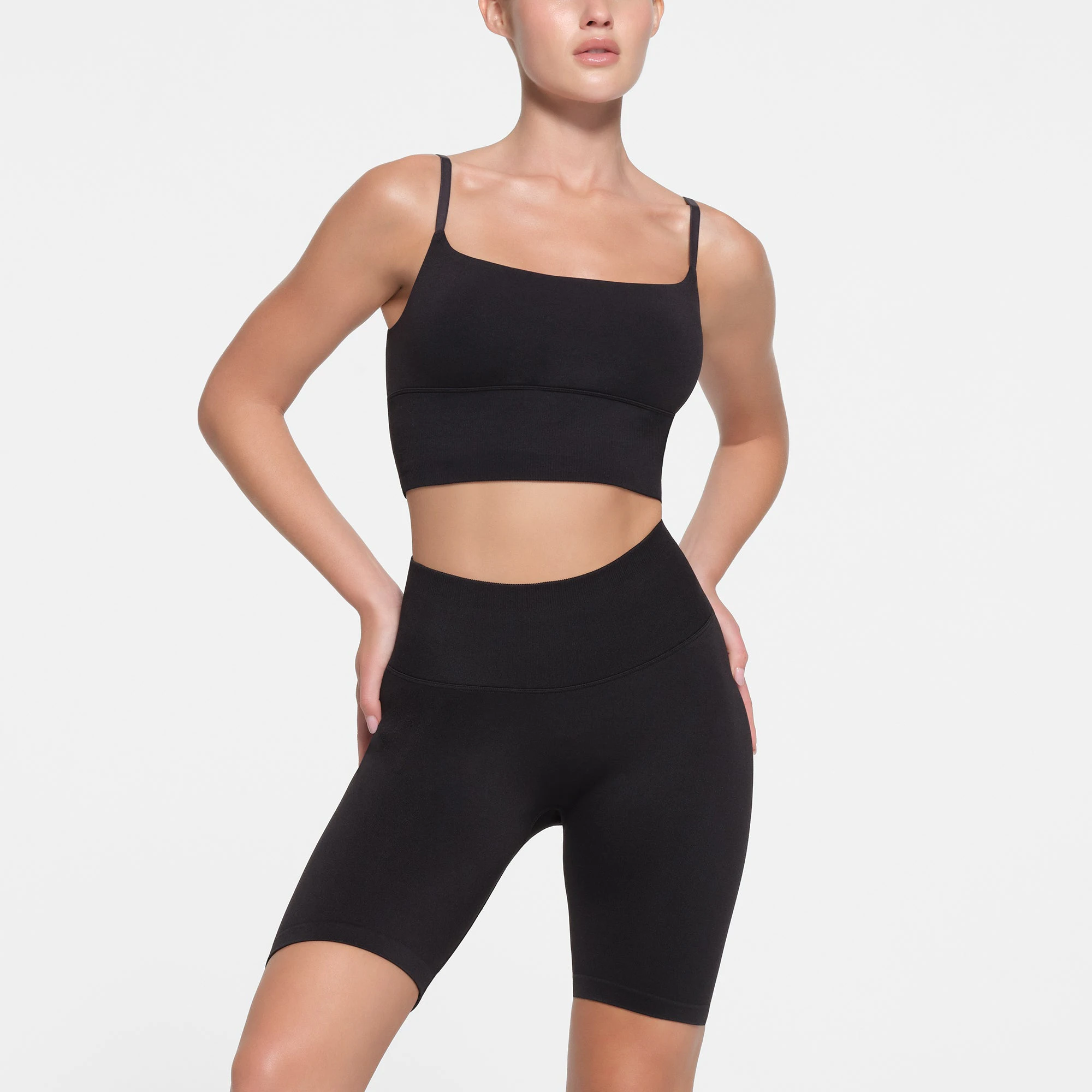 CONTOUR NYLON BIKE SHORT | ONYX ON A MODEL FRONT VIEW