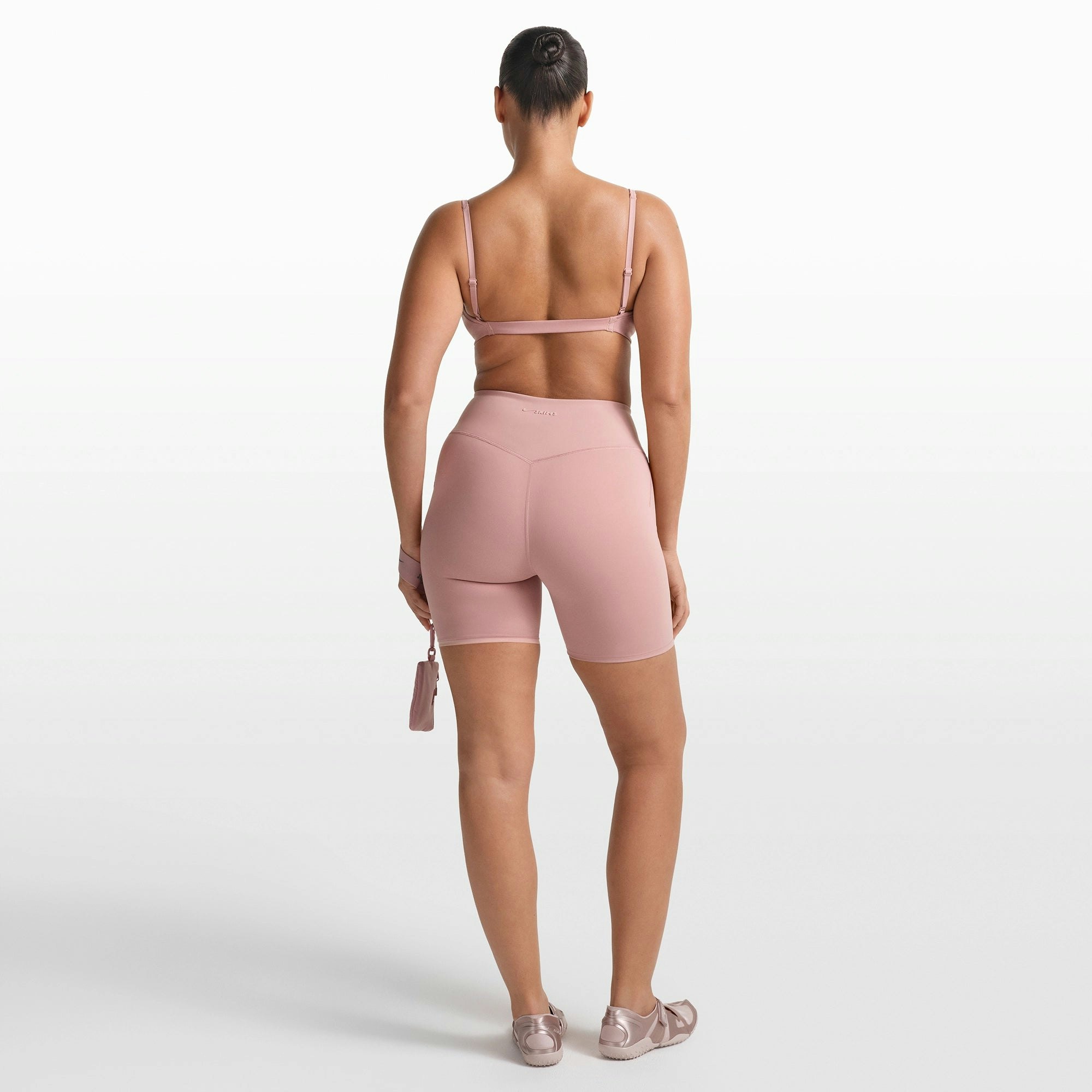 NikeSKIMS MATTE 5" BIKER SHORT | HIMALAYAN ON A MODEL FRONT VIEW @ | FOCUS: 0.0, 1.0, 0.9