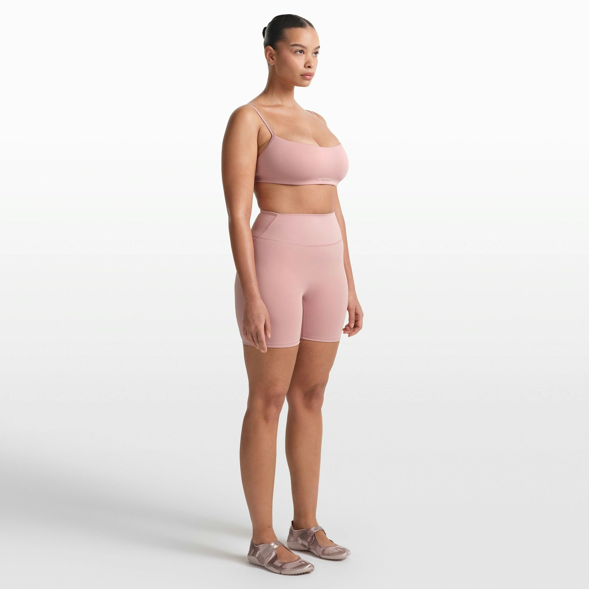 NikeSKIMS MATTE 5" BIKER SHORT | HIMALAYAN ON A MODEL FRONT VIEW @ | FOCUS: 0.0, 1.0, 0.9