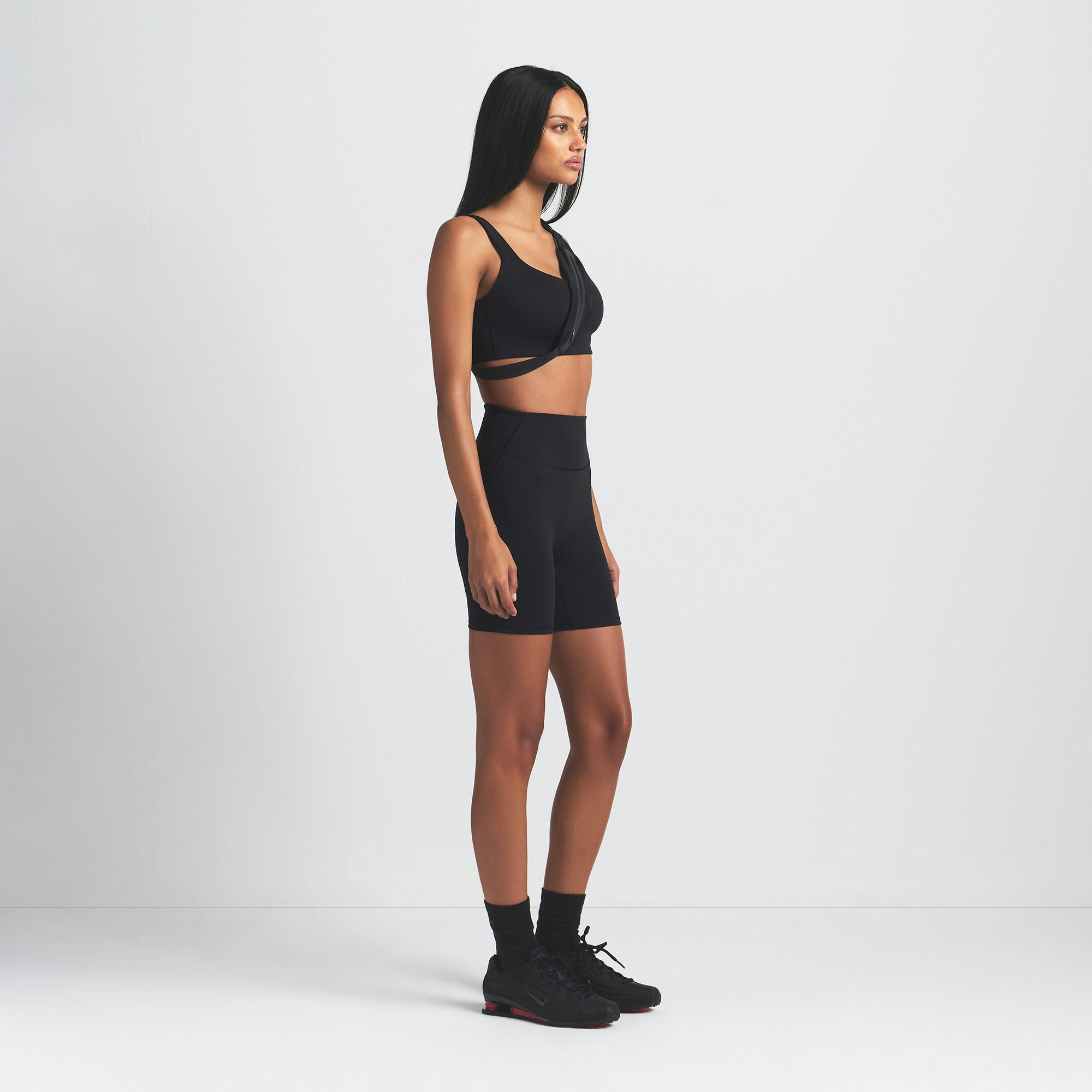 NikeSKIMS MATTE 5" BIKER SHORT | OBSIDIAN ON A MODEL SIDE VIEW