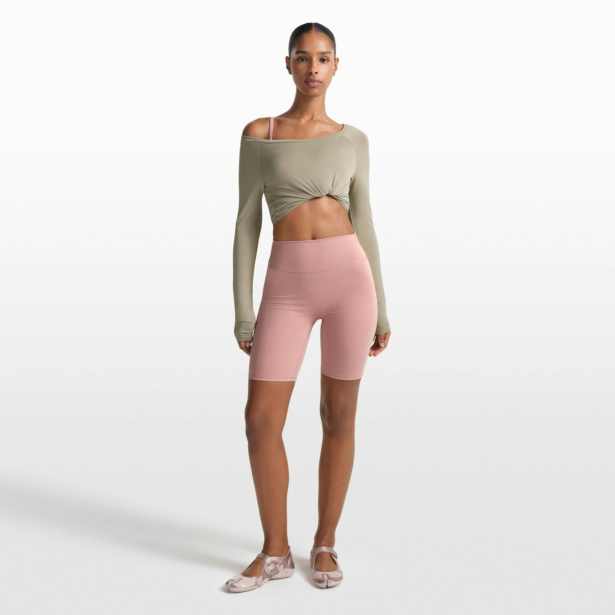 NikeSKIMS MATTE 7" BIKER SHORT | HIMALAYAN ON A MODEL FRONT VIEW @ | FOCUS: 0.0, 1.0, 0.9