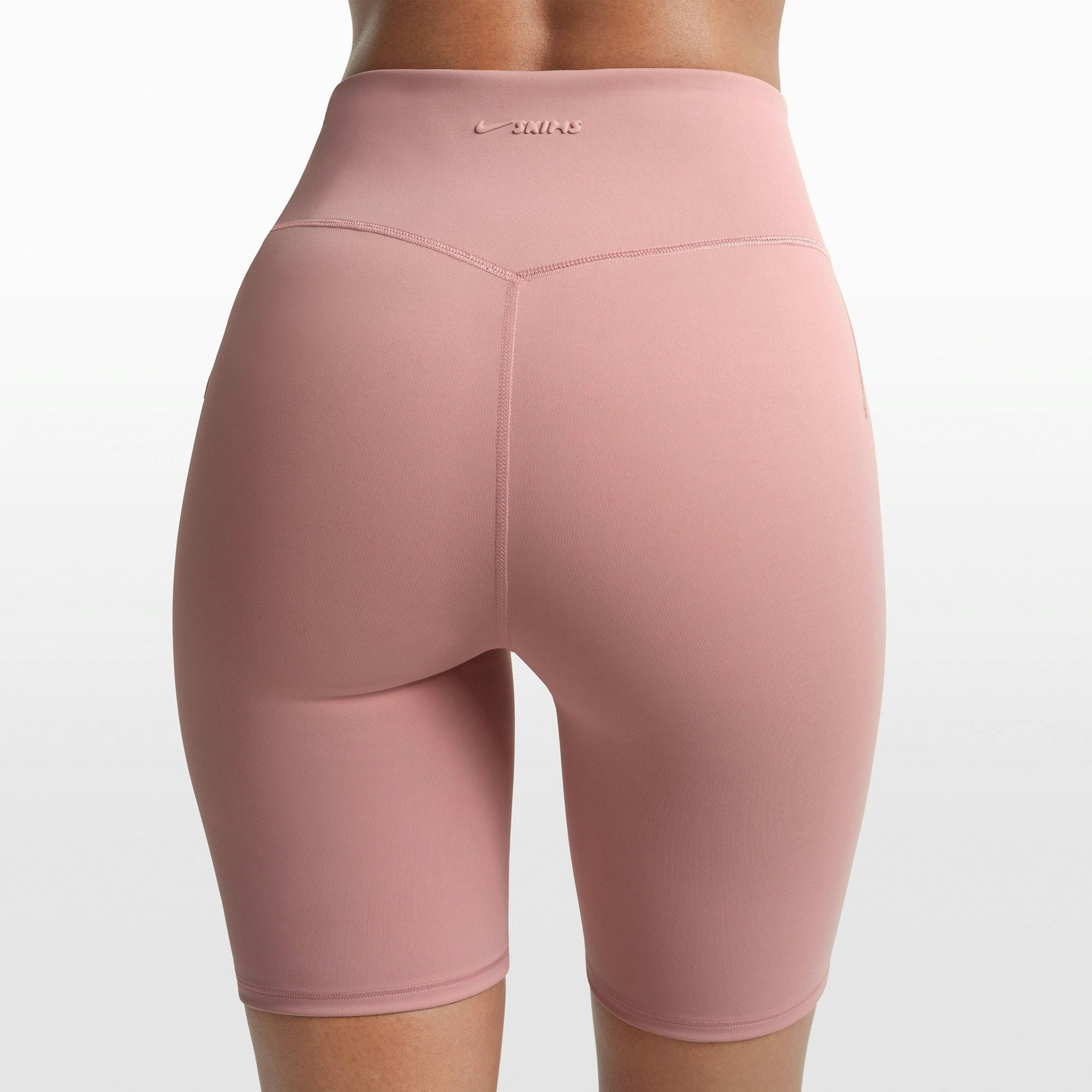 NikeSKIMS MATTE 7" BIKER SHORT | HIMALAYAN ON A MODEL FRONT VIEW @ | FOCUS: 0.0, 1.0, 0.9