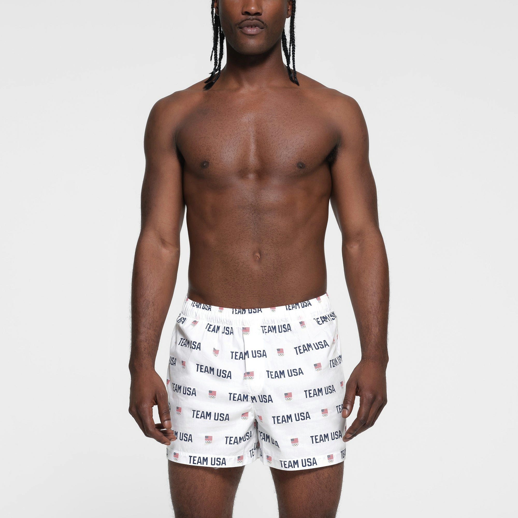 SKIMS FOR TEAM USA COTTON POPLIN SLEEP MENS OLYMPIC BOXER | WHITE ON A MODEL FRONT VIEW