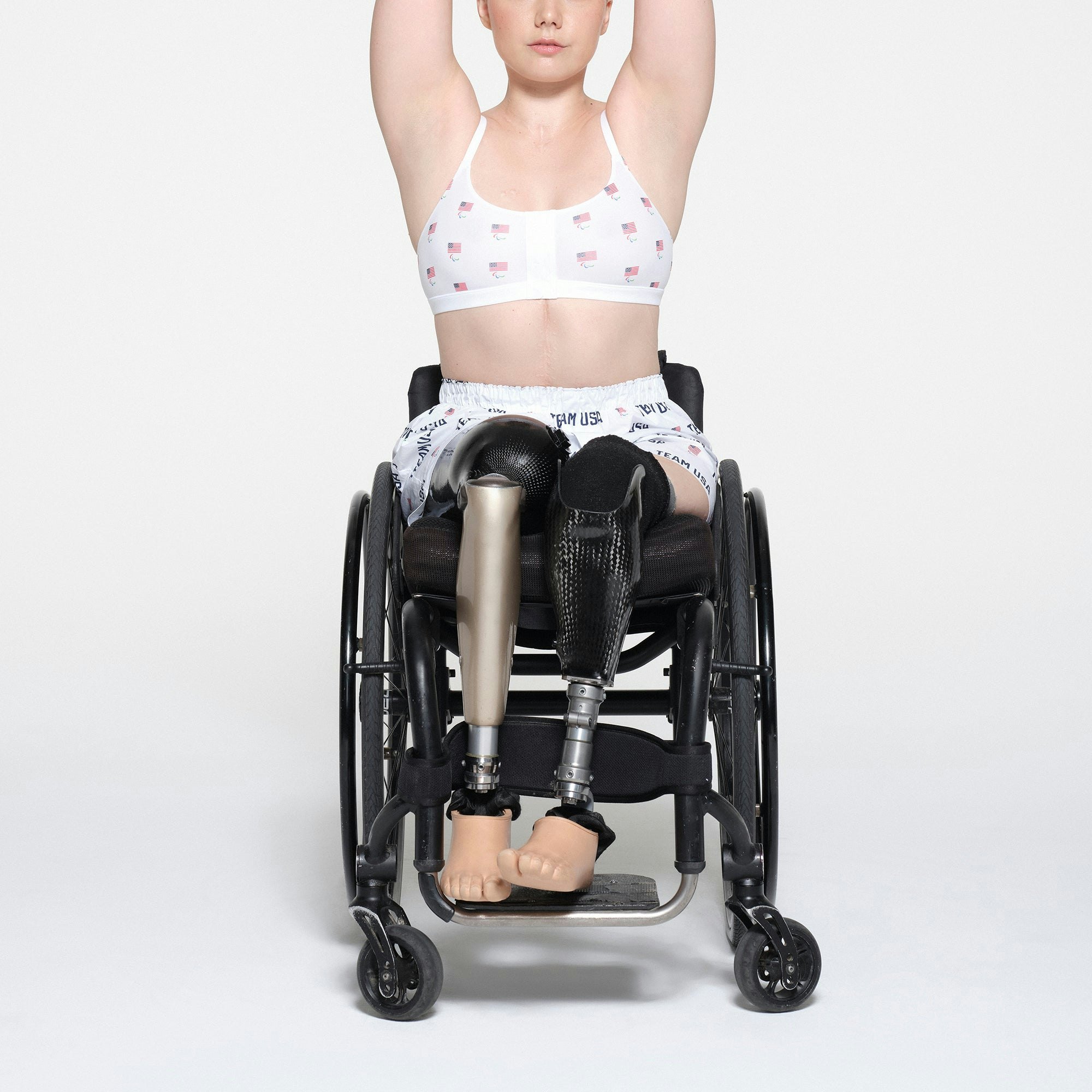 SKIMS FOR TEAM USA COTTON POPLIN SLEEP PARALYMPIC BOXER | WHITE ON A MODEL FRONT VIEW | FOCUS: 0.1, 1, 0.9