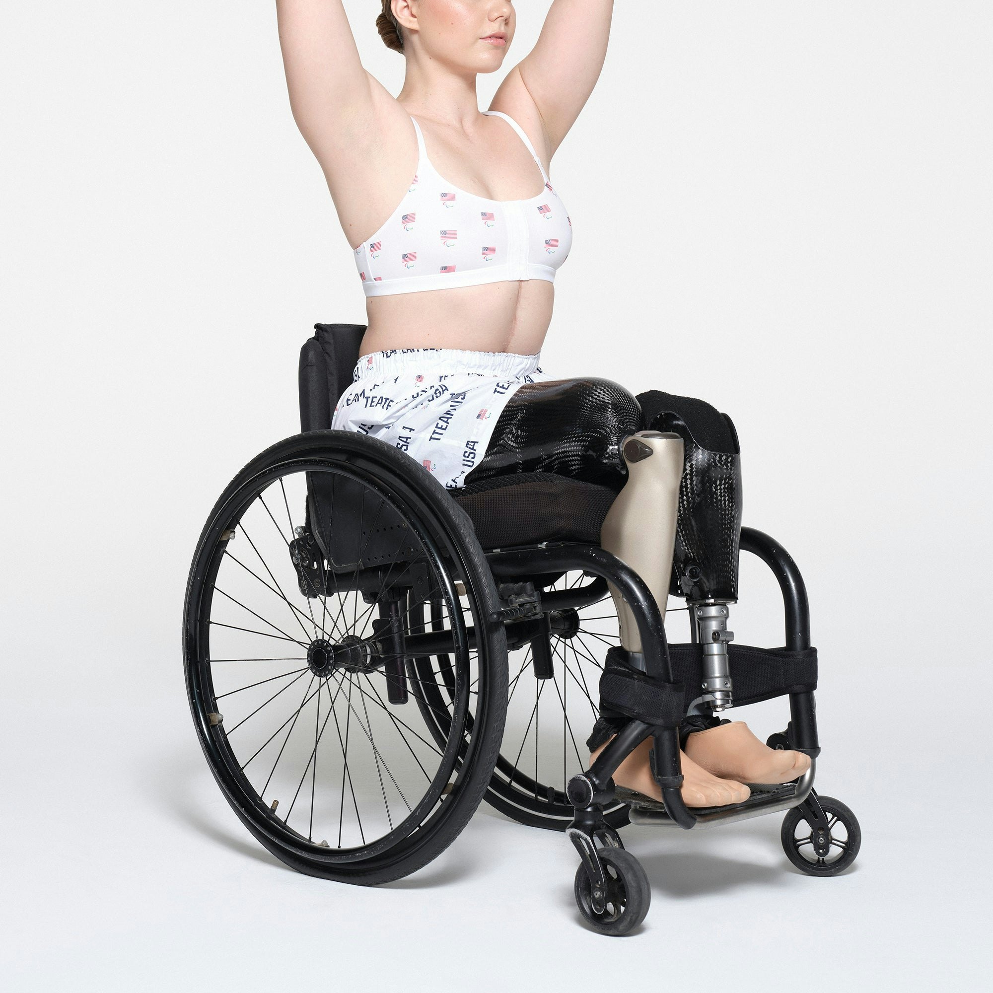 SKIMS FOR TEAM USA COTTON POPLIN SLEEP PARALYMPIC BOXER | WHITE ON A MODEL SIDE VIEW