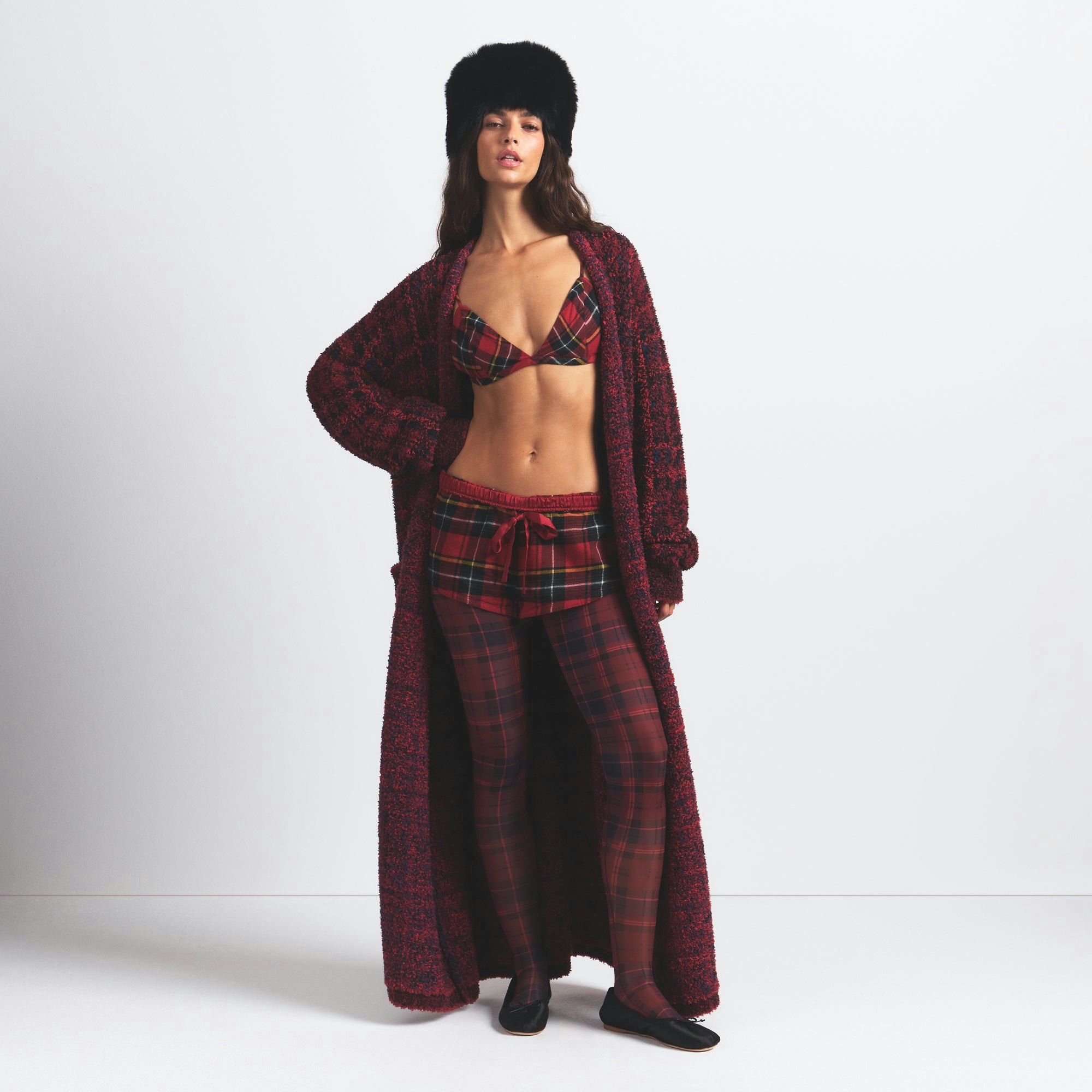 FLANNEL SLEEP MICRO SHORT | RED HOLIDAY PLAID ON A MODEL FRONT VIEW @ | FOCUS: 0.0, 1.0, 0.9