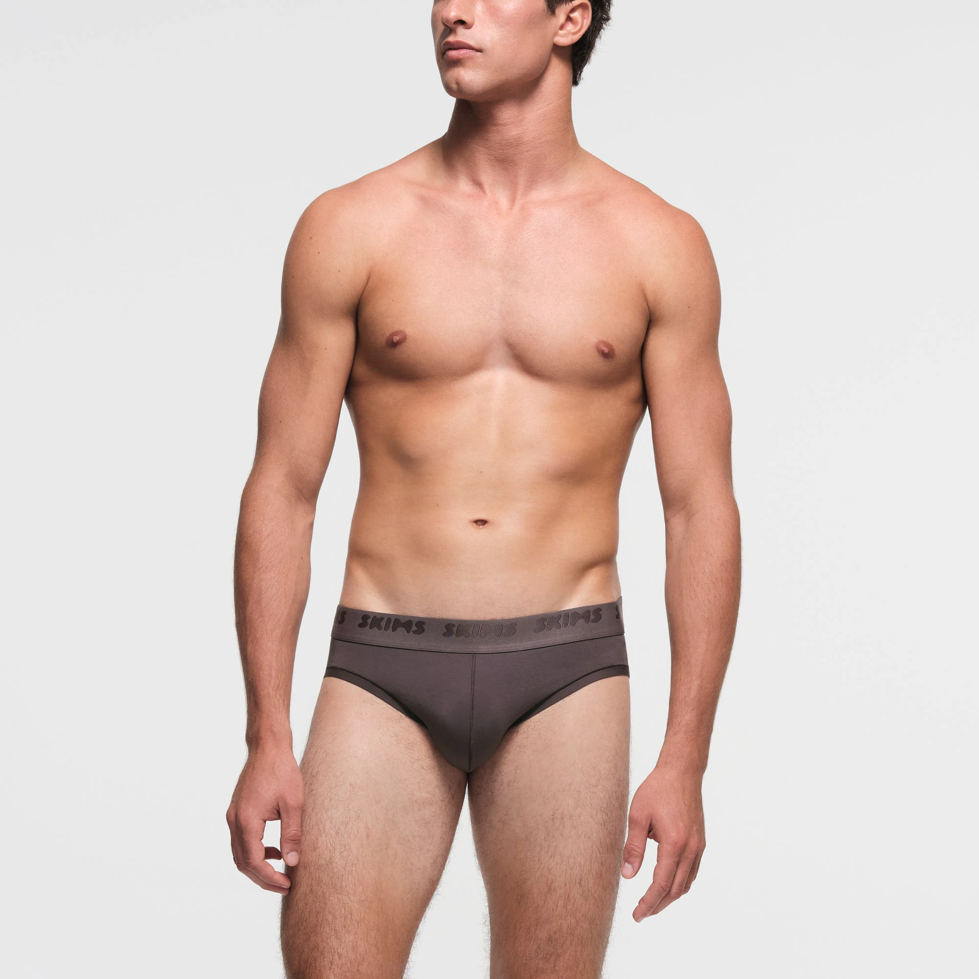 SKIMS STRETCH MENS BRIEF | IRON ON A MODEL FRONT VIEW