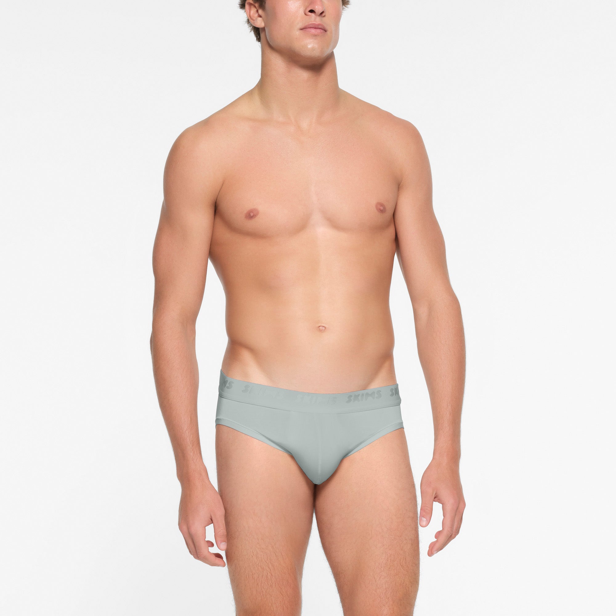 SKIMS STRETCH MENS BRIEF | VAPOR ON A MODEL FRONT VIEW