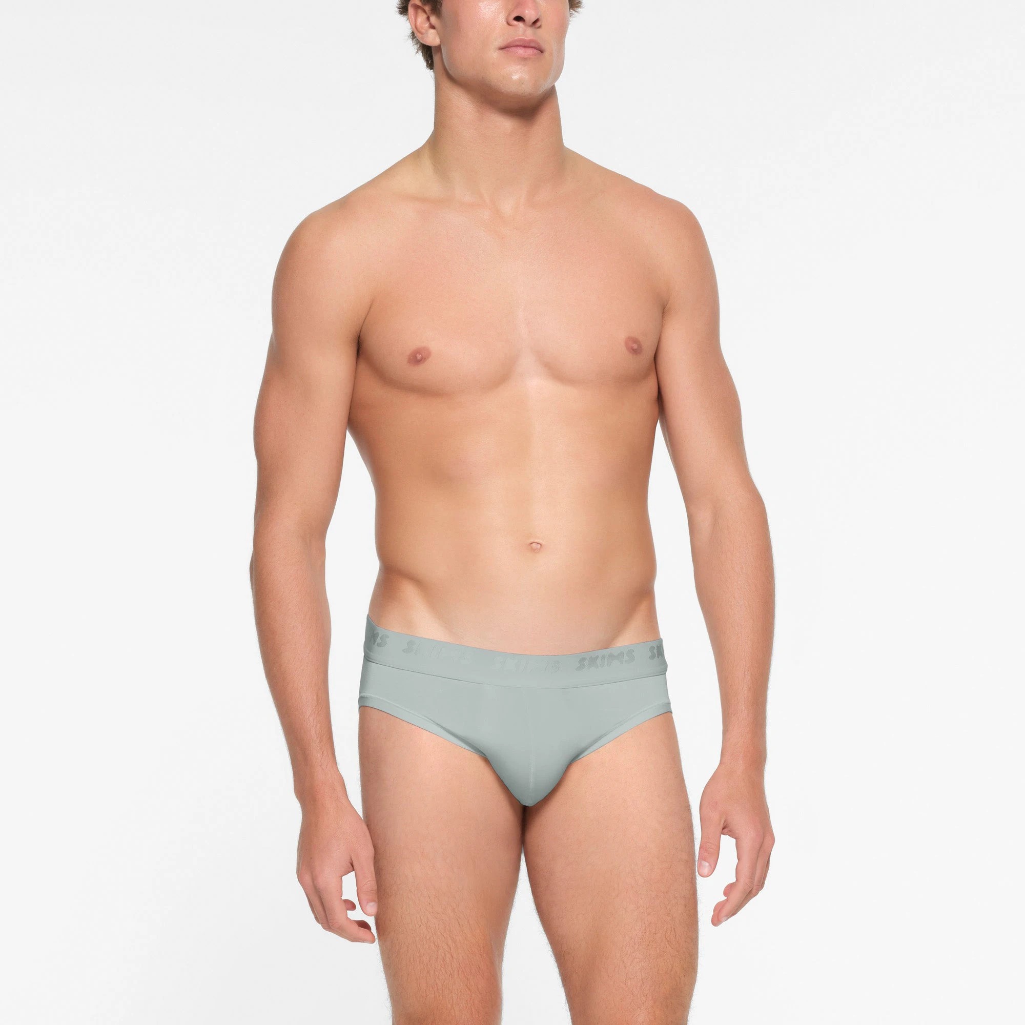 SKIMS STRETCH MENS BRIEF | VAPOR ON A MODEL FRONT VIEW
