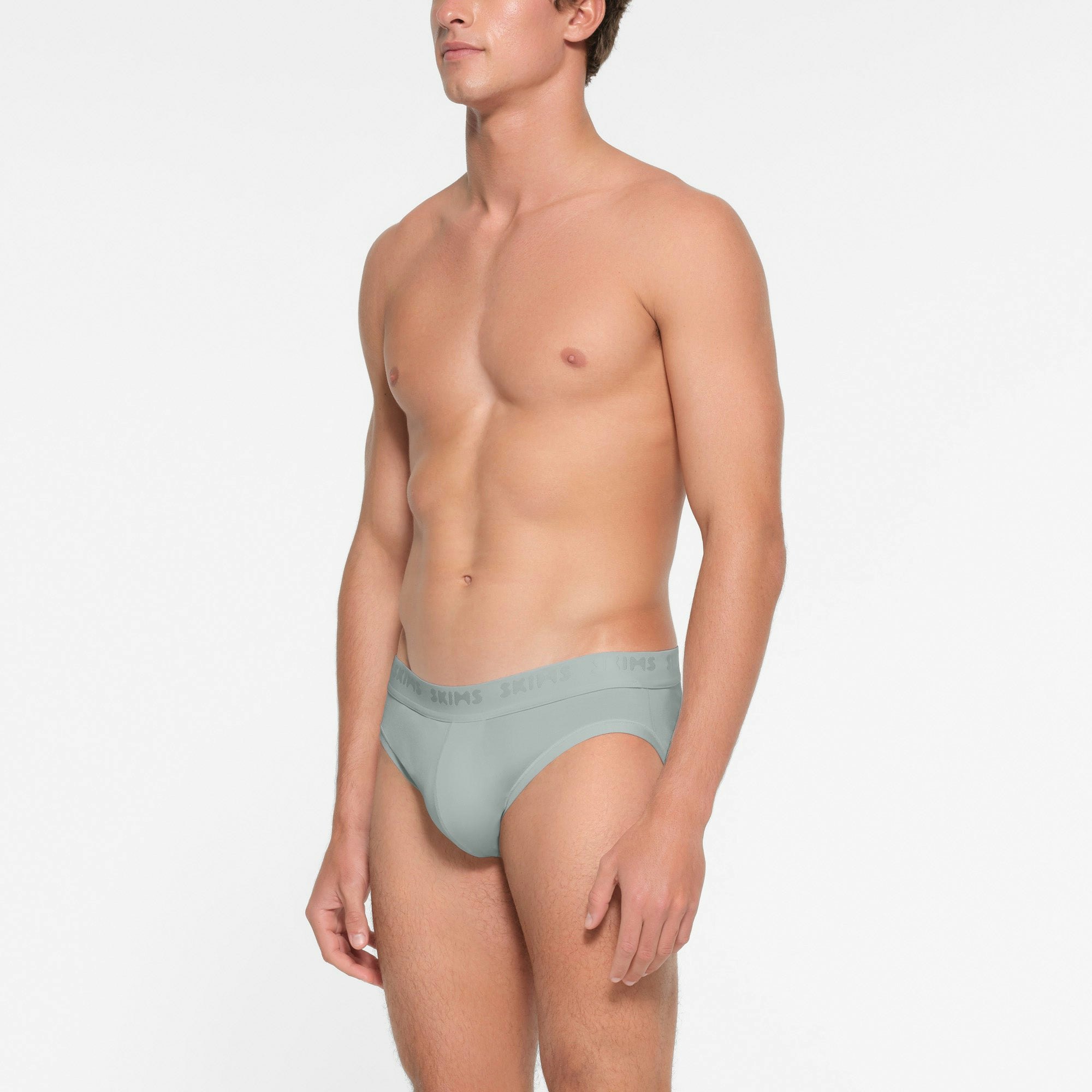 SKIMS STRETCH MENS BRIEF | VAPOR ON A MODEL FRONT VIEW