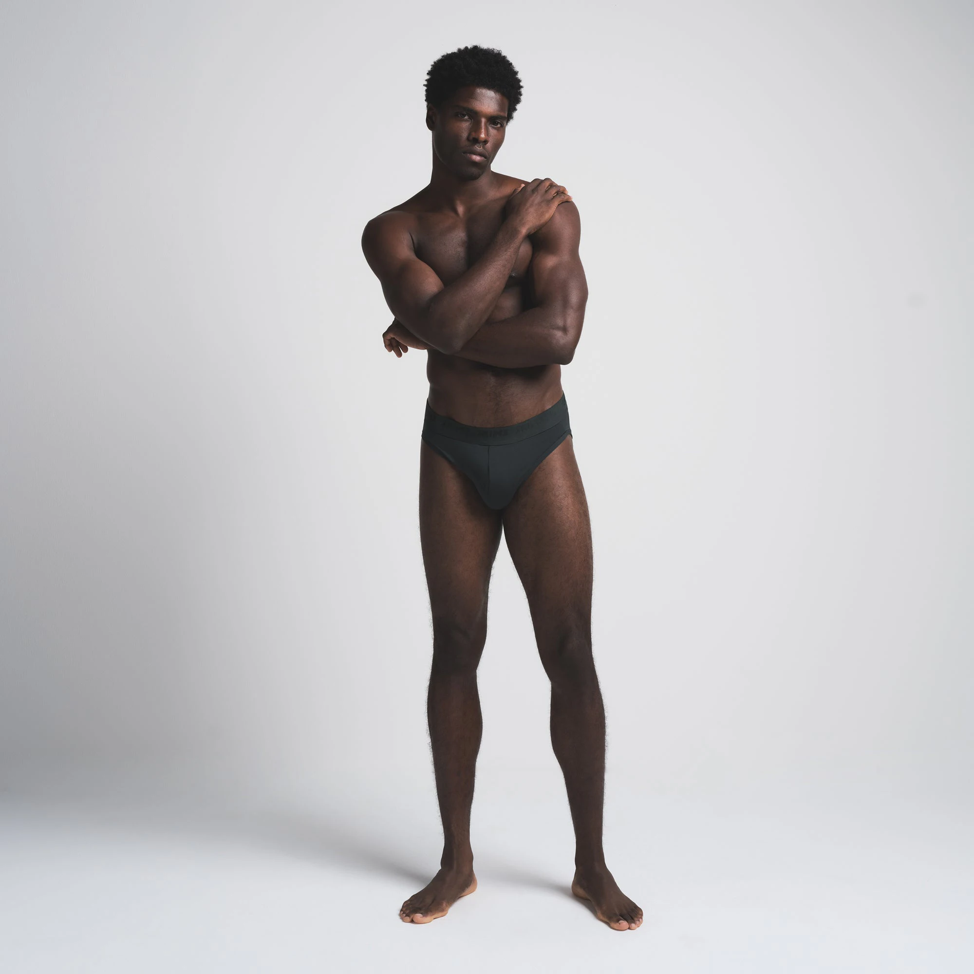 SKIMS STRETCH MENS BRIEF 3-PACK | CYPRESS MULTI ON A MODEL FRONT VIEW | FOCUS: 0.0, 1.0, 0.9