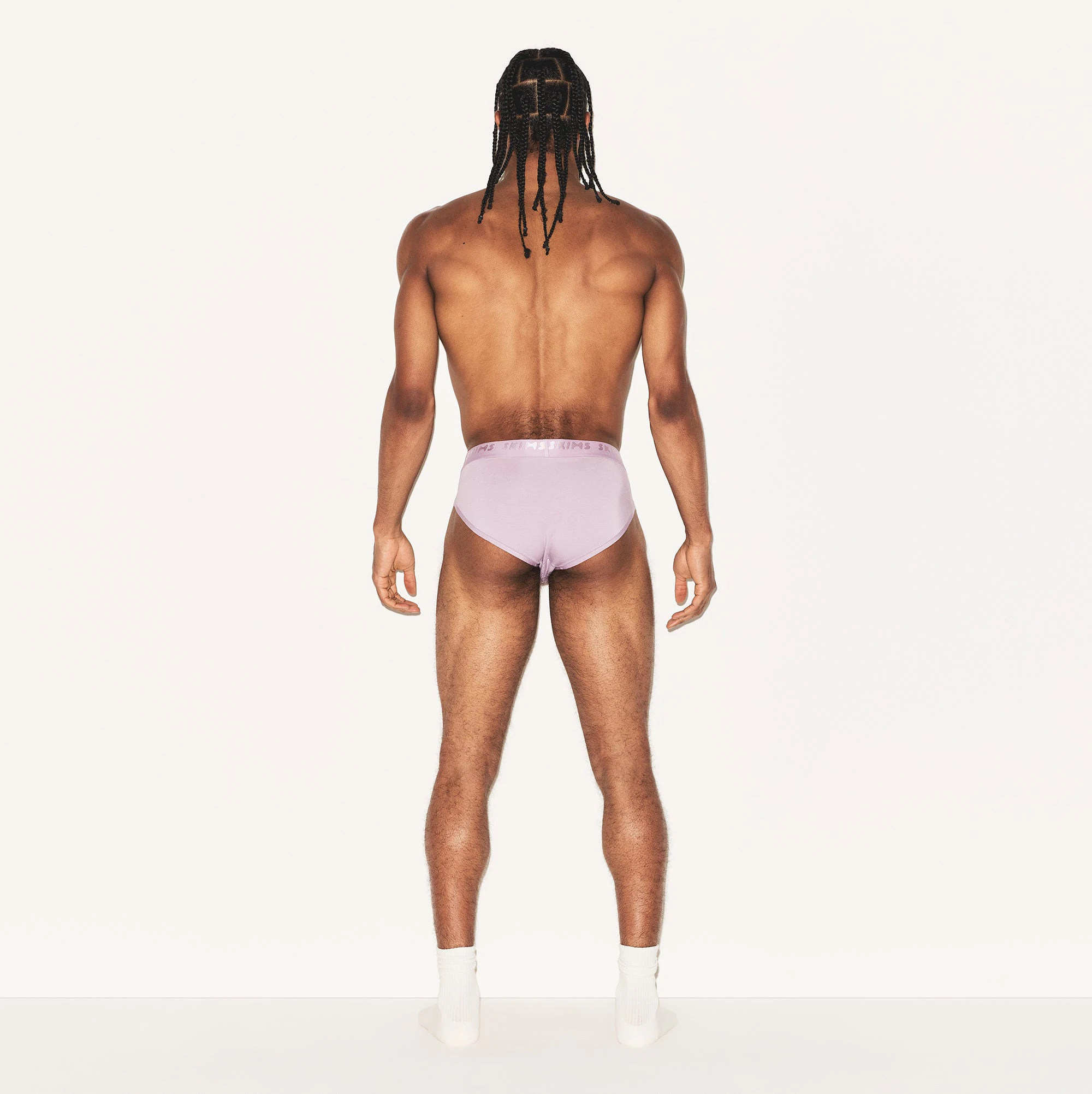SKIMS STRETCH MENS BRIEF 3-PACK  | MELROSE MULTI ON A MODEL BACK VIEW | FOCUS: 0.0, 1.0, 0.9