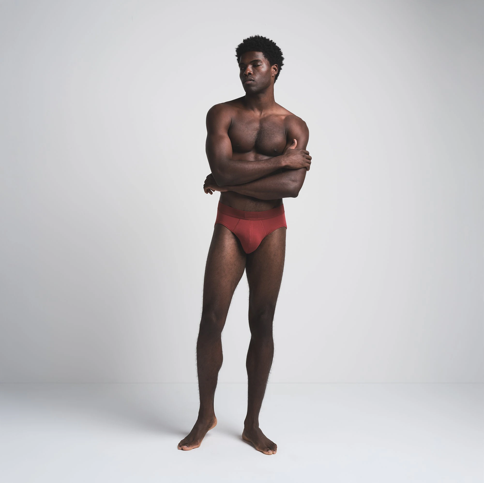 SKIMS COTTON MENS BRIEF 3-PACK | MERLOT MULTI ON A MODEL FRONT VIEW | FOCUS: 0.0, 1.0, 0.9