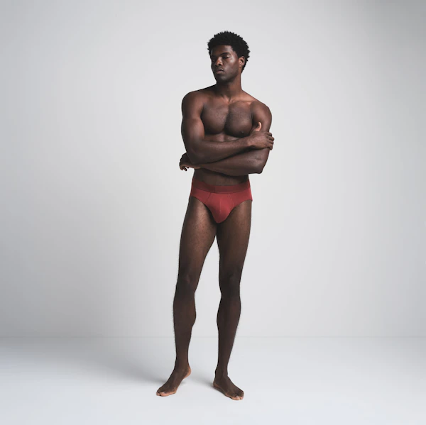 SKIMS COTTON MENS BRIEF 3-PACK | MERLOT MULTI ON A MODEL FRONT VIEW | FOCUS: 0.0, 1.0, 0.9